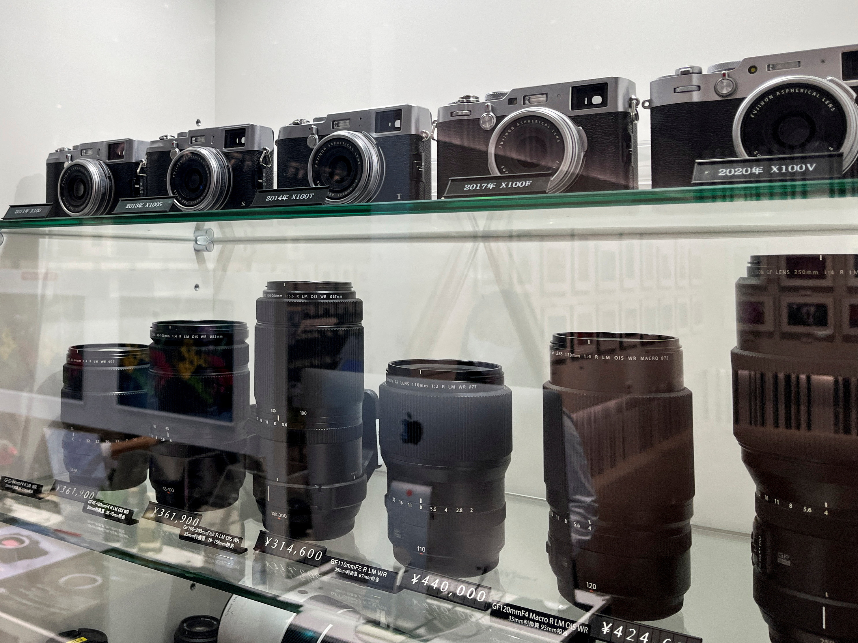 Cameras and lenses are displayed at Fujifilm Holdings headquarters in Tokyo