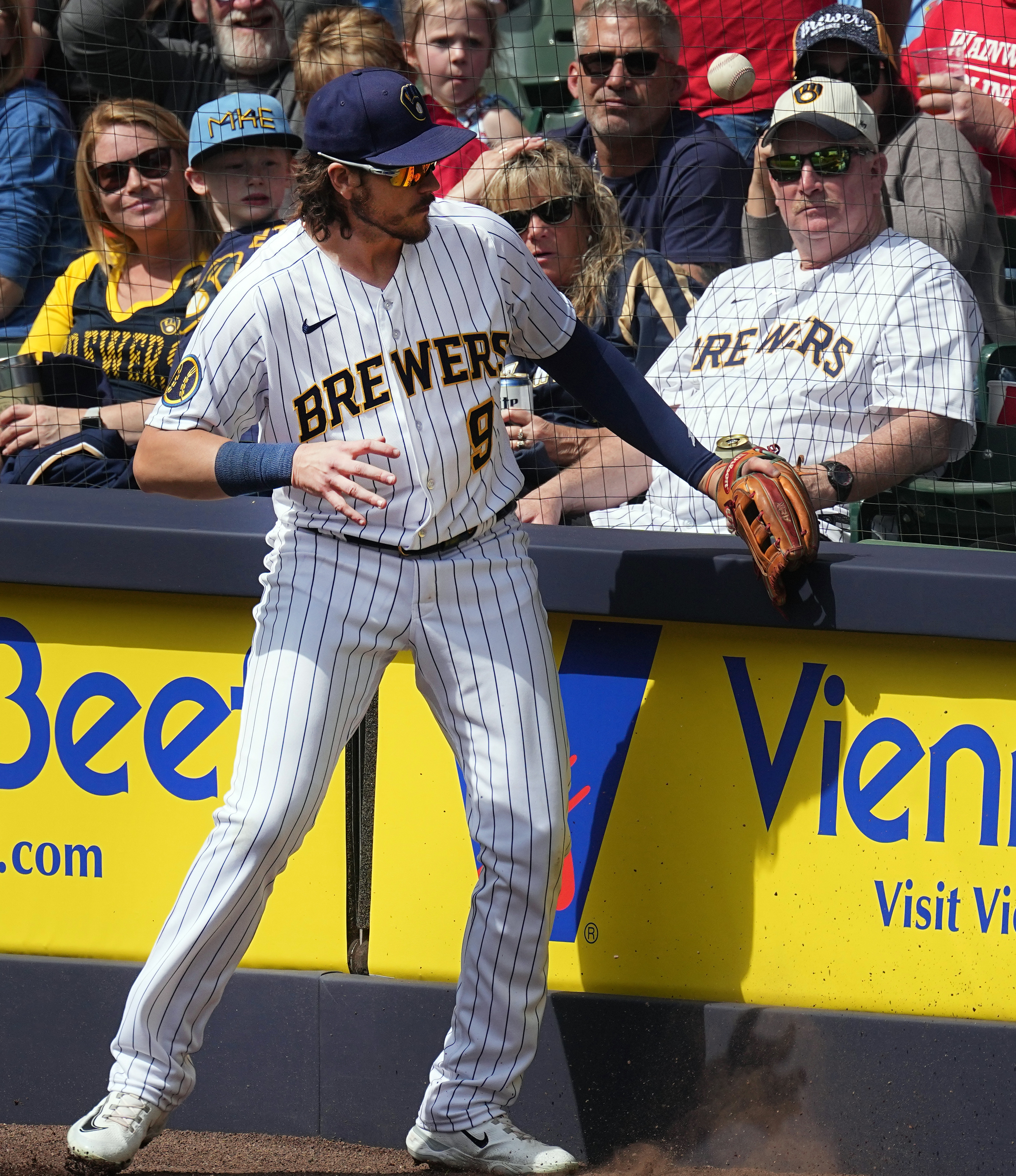 Willy Adames of the Milwaukee Brewers reacts after drawing a walk
