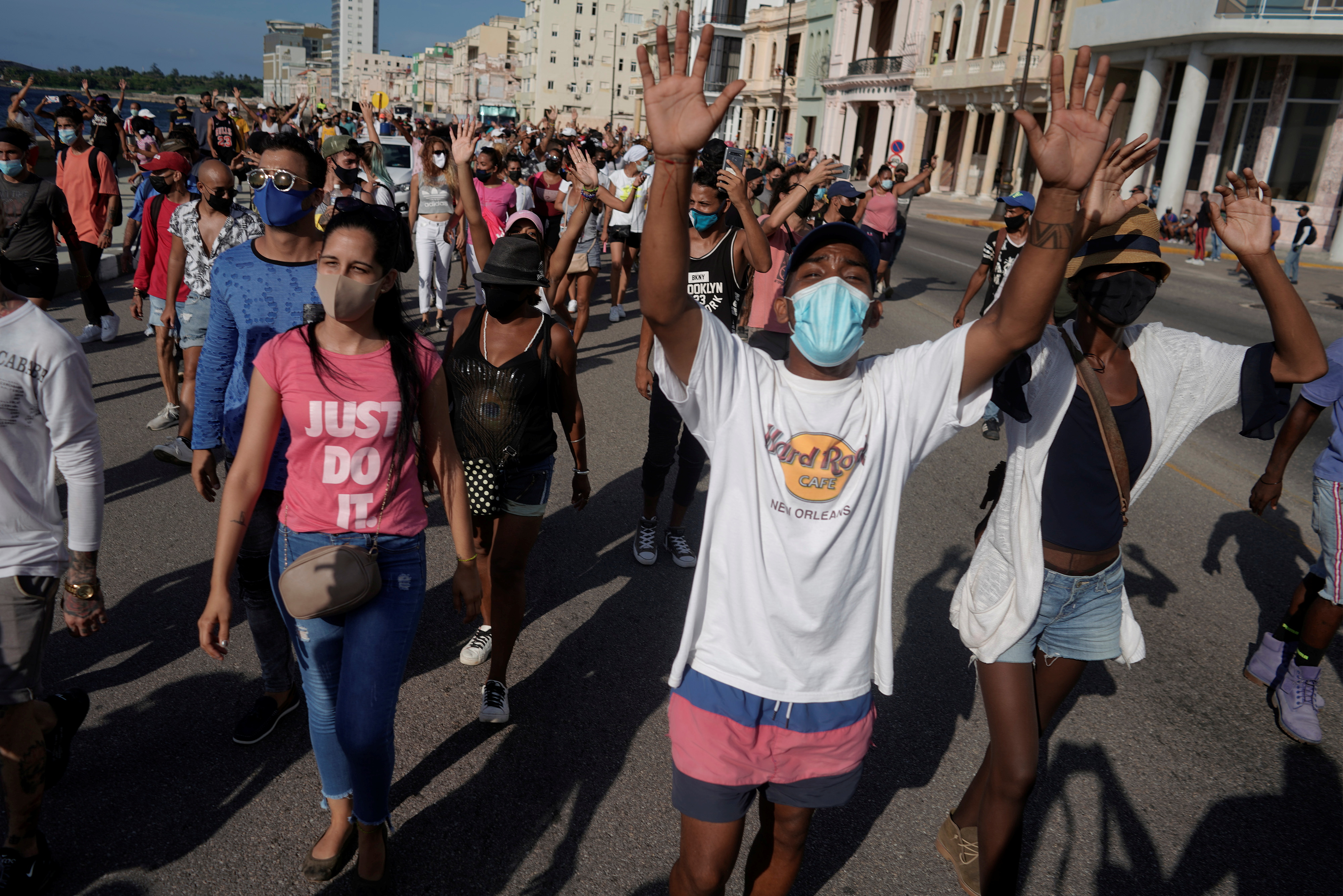 People shout slogans against the government during a protest in Havana
