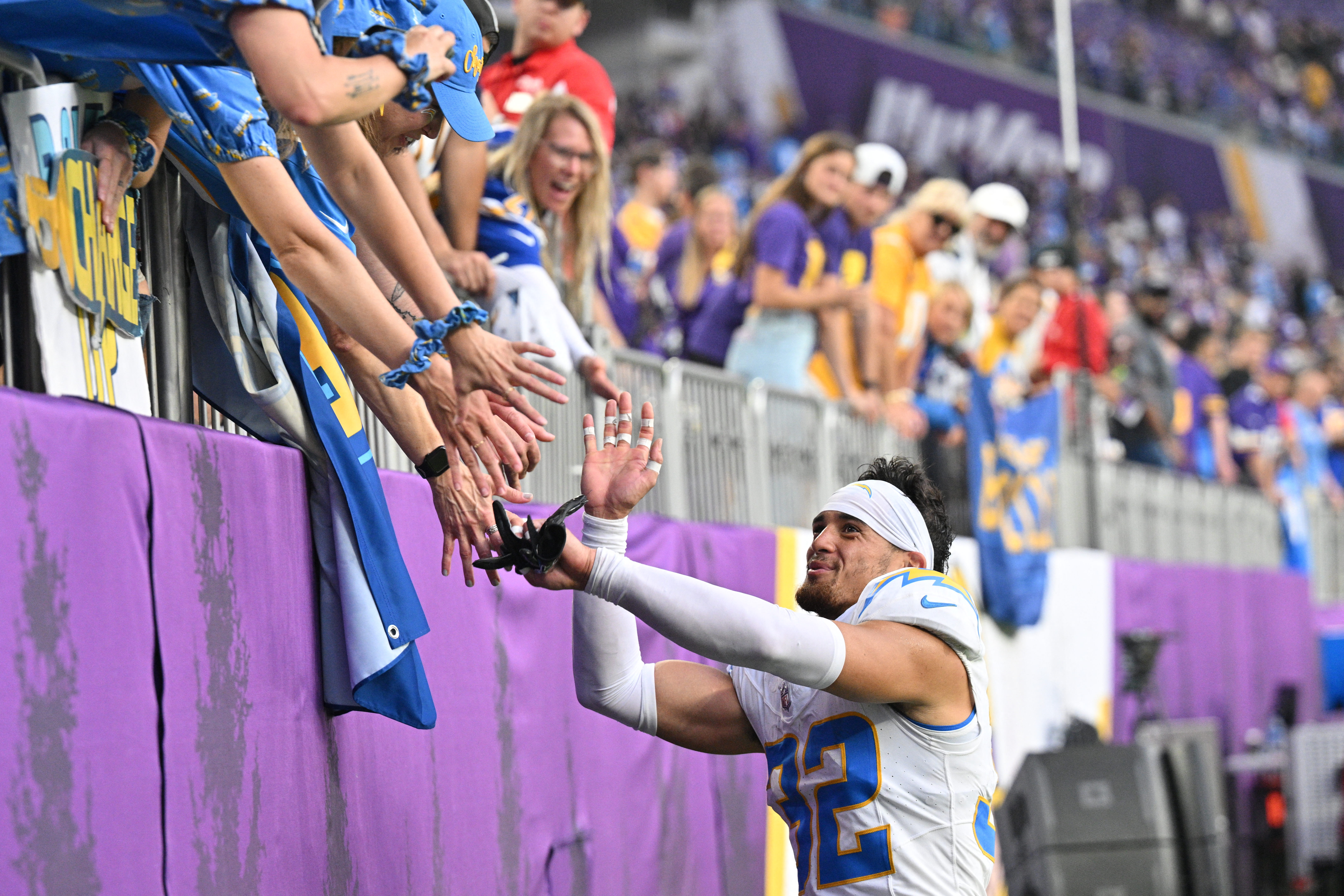 Chargers survive cliff-hanger with Vikings on end zone pick