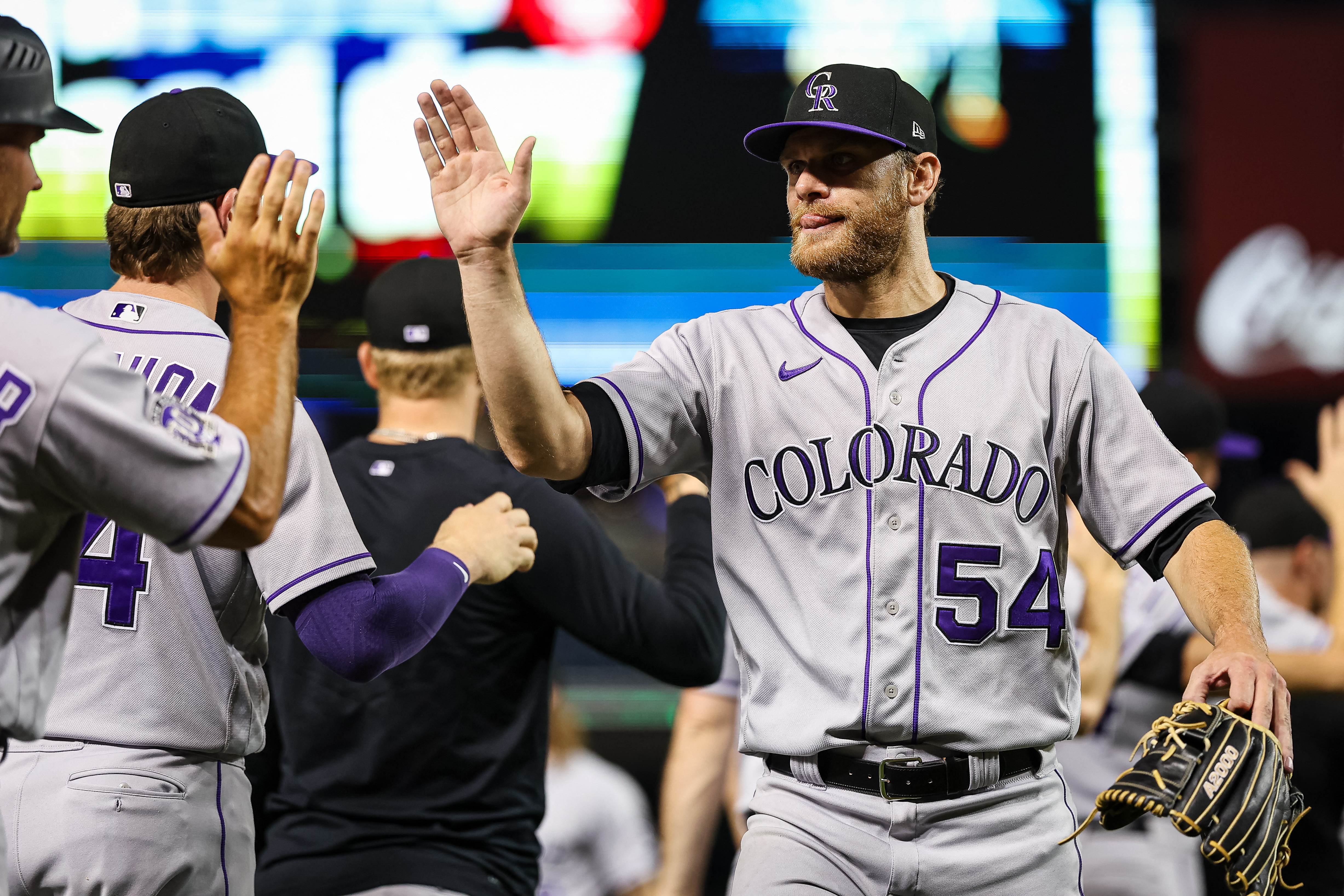 Colorado Rockies' Michael Toglia reacts after being hit by a pitch during  the ninth inning of a baseball game against the Washington Nationals at  Nationals Park, Monday, July 24, 2023, in Washington. (