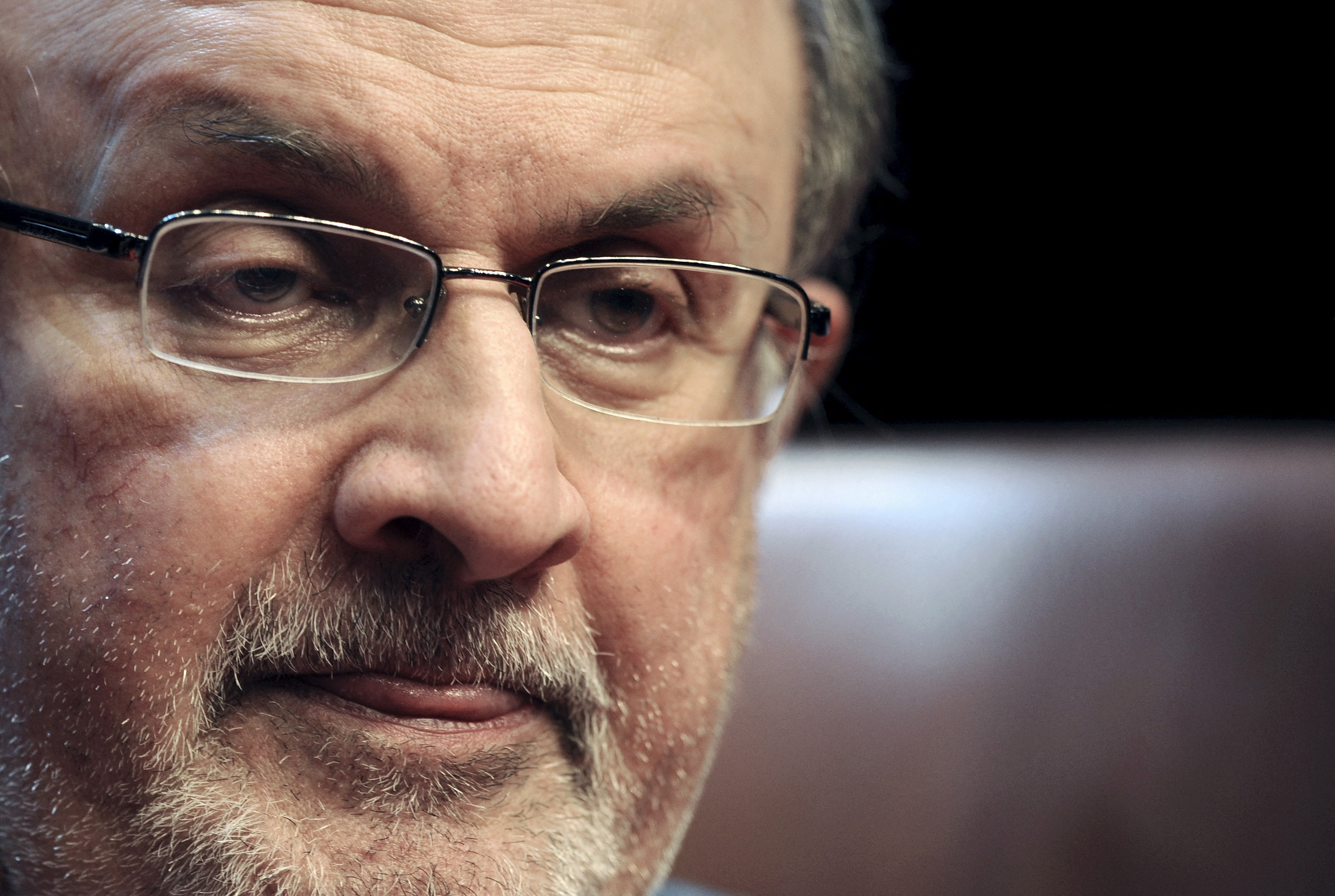 Author Rushdie reacts during a news conference before the presentation of his latest book 'Two Years Eight Months and Twenty-Eight Nights' at the Niemeyer Center in Aviles