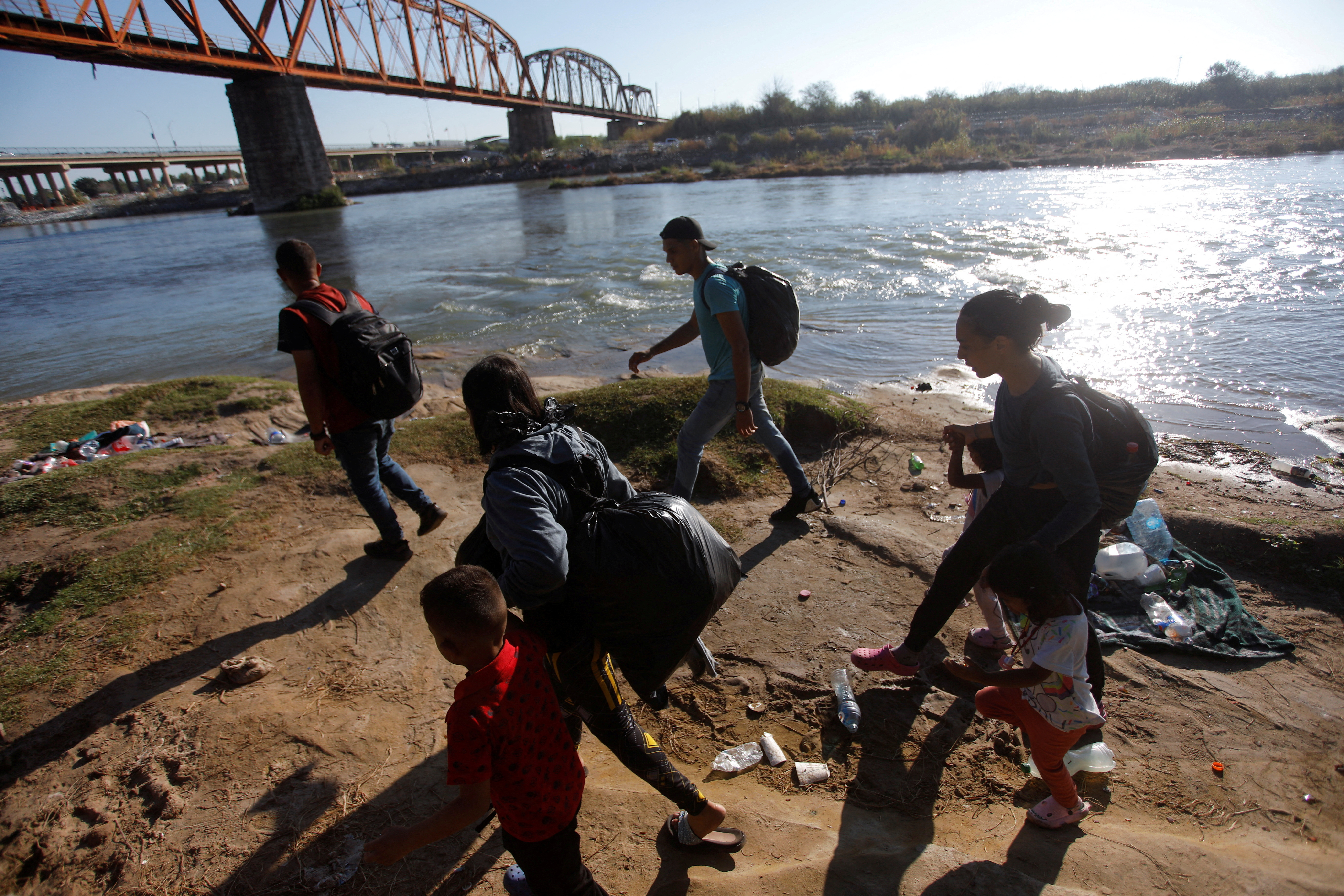 Migrants arrive at the U.S.-Mexico border to cross the Rio Grande river, in Piedras Negras