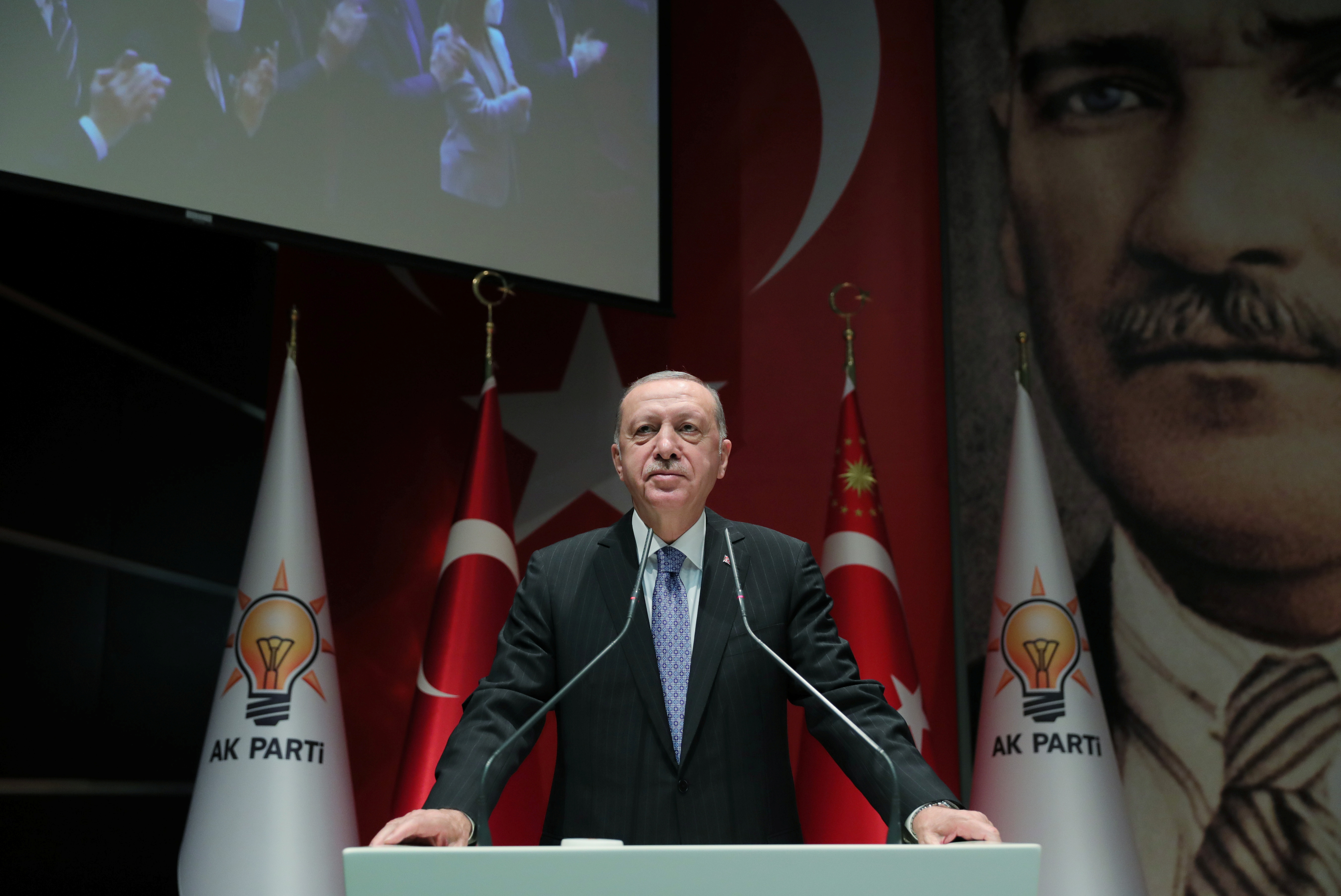 Turkish President Tayyip Erdogan addresses members of his ruling AK Party in Ankara