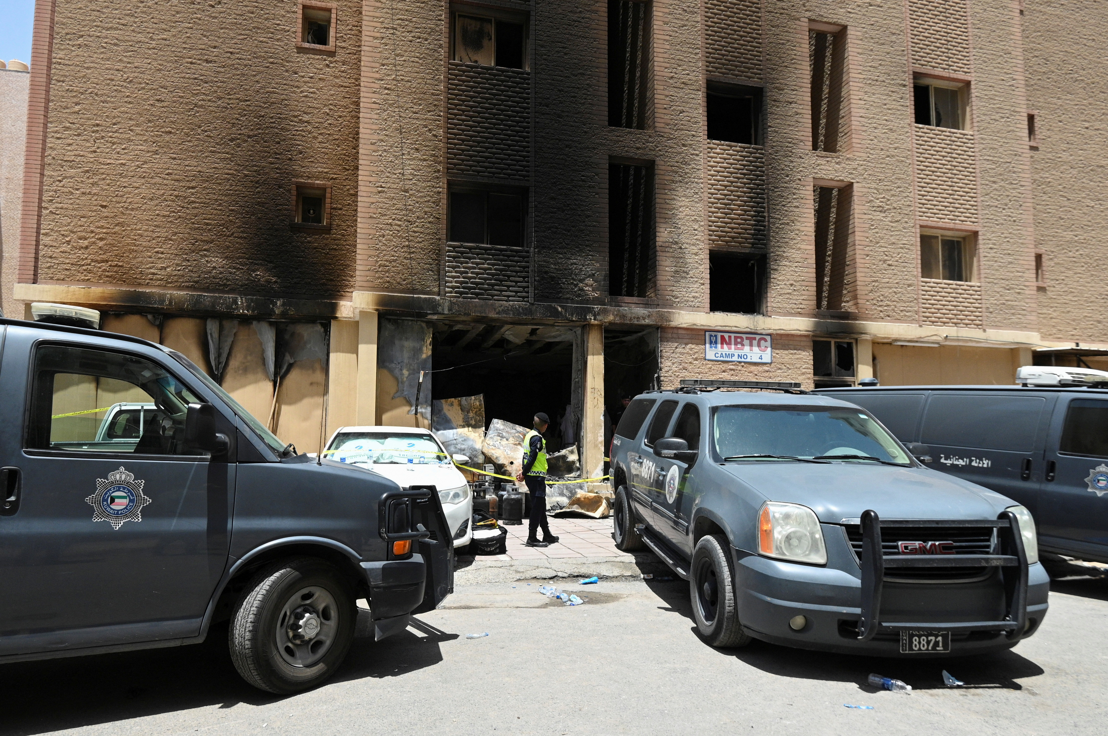 Aftermath of a deadly fire in a building, in Mangaf
