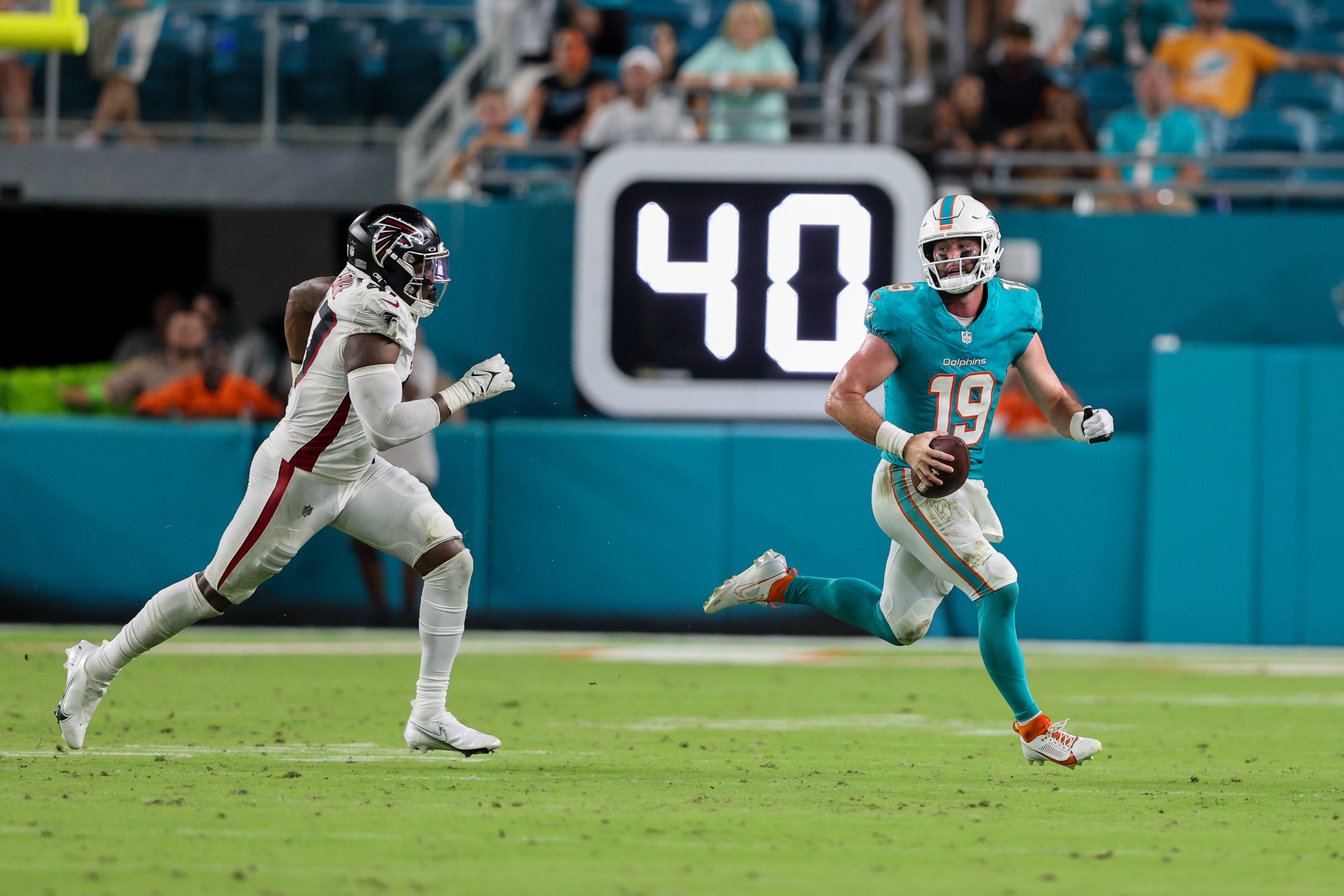 Atlanta Falcons running back Godwin Igwebuike sprints through Miami  Dolphins for an 11-yard TD run