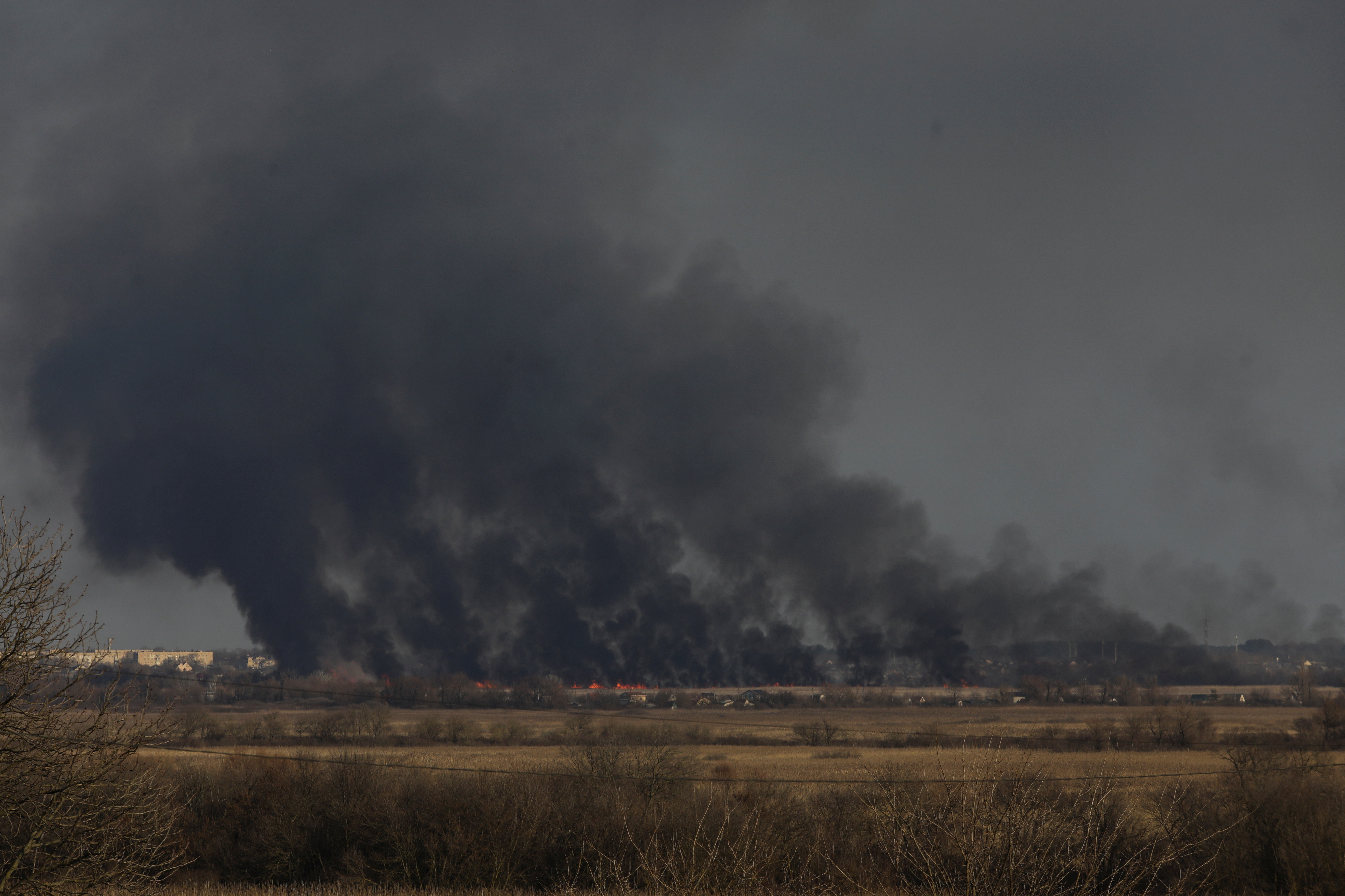 A smoke billows after a shelling in Kherson