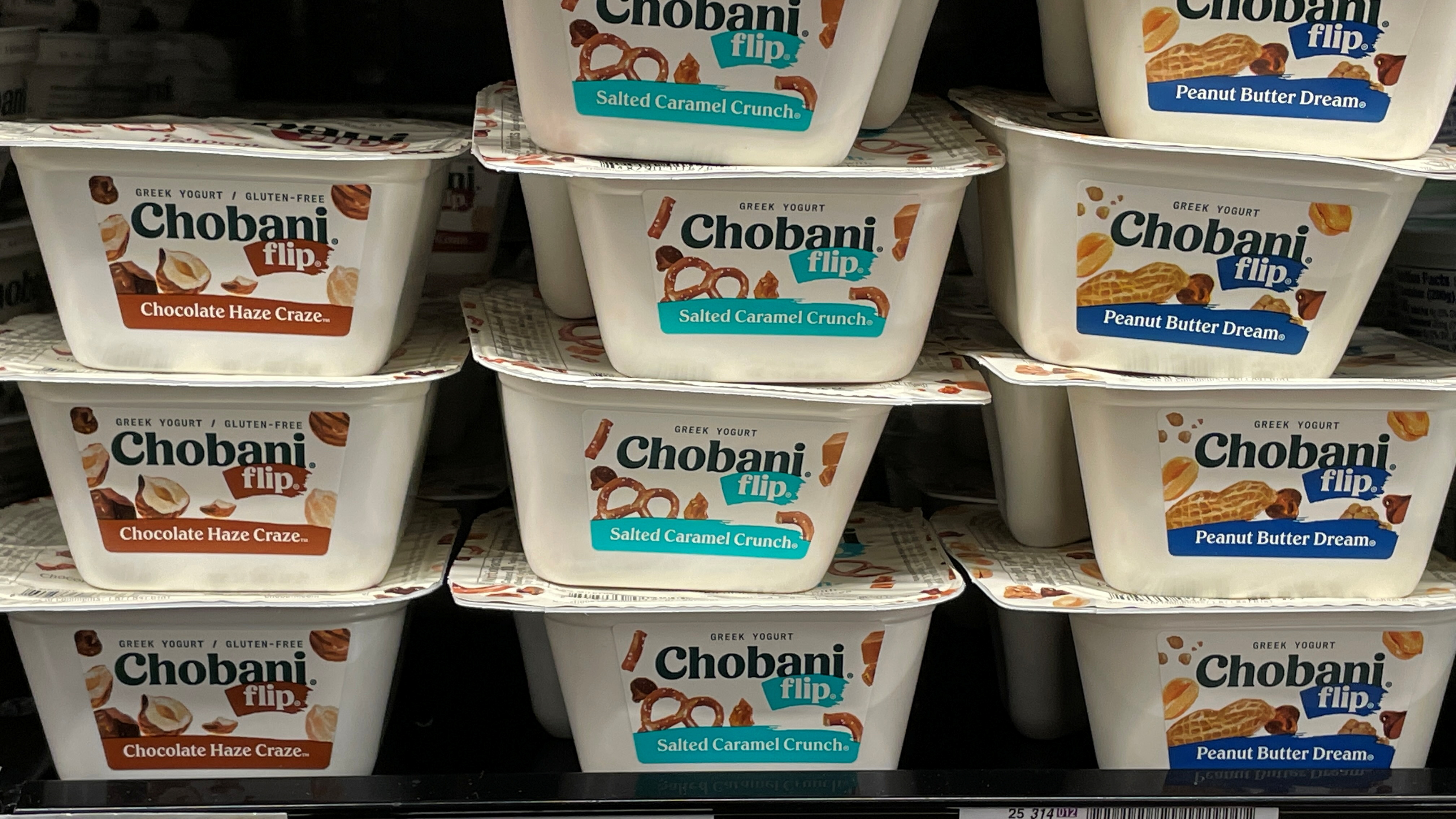 Greek-yogurt maker Chobani is shown for sale in a grocery store in San Diego, California. Greek-yogurt maker Chobani could be valued at more than $10 billion in its initial public offering (IPO), a person familiar with the matter told Reuters on Wednesday, as the company confidentially filed regulatory paperwork for its stock market listing. July 07, 2021.  REUTERS/Mike Blake