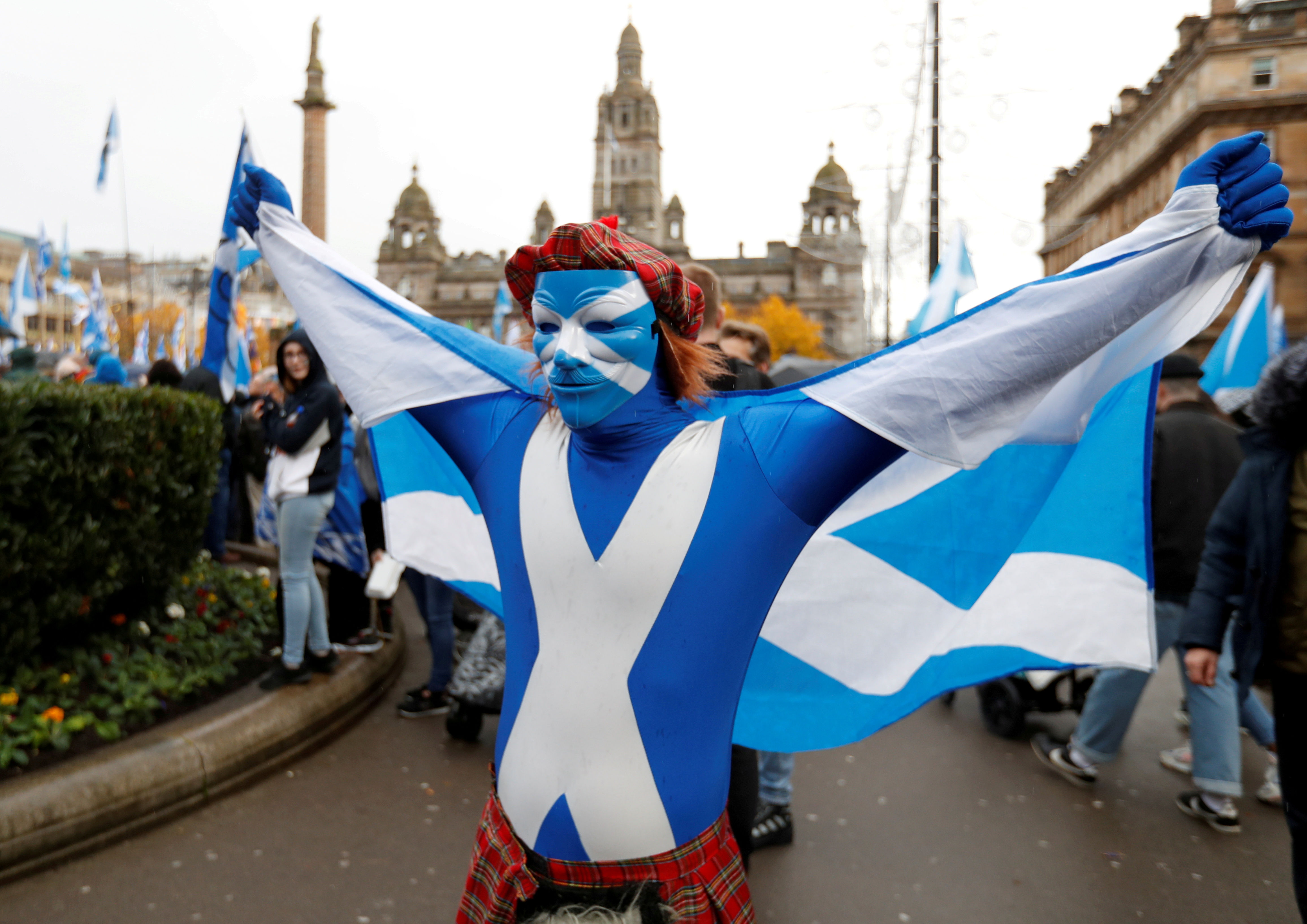 A demonstrator holds a flag during a pro-Scottish Independence rally in Glasgow, Scotland, November 2