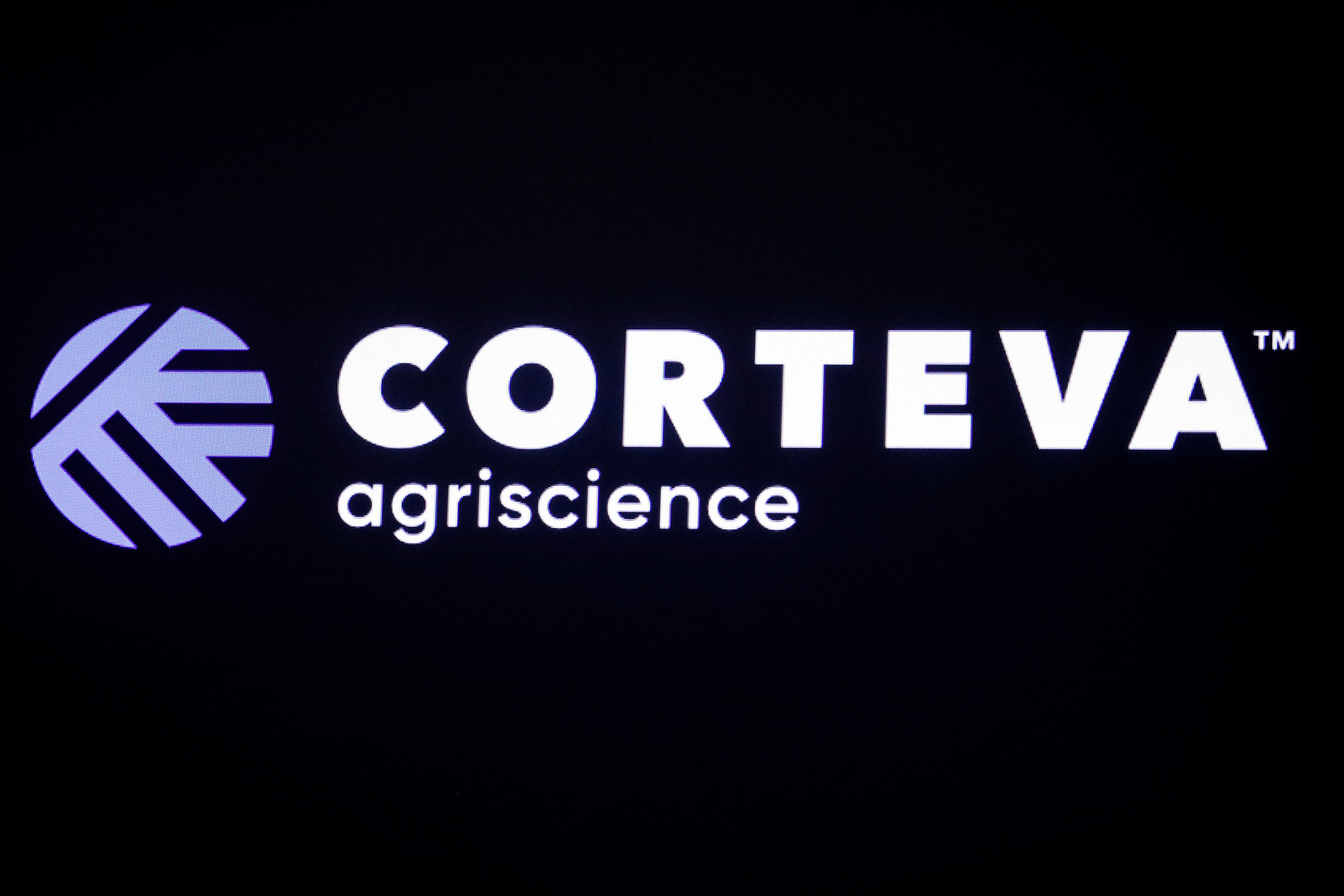 The logo for Corteva Agriscience, a former division of DowDuPont, is displayed on a screen at the NYSE in New York