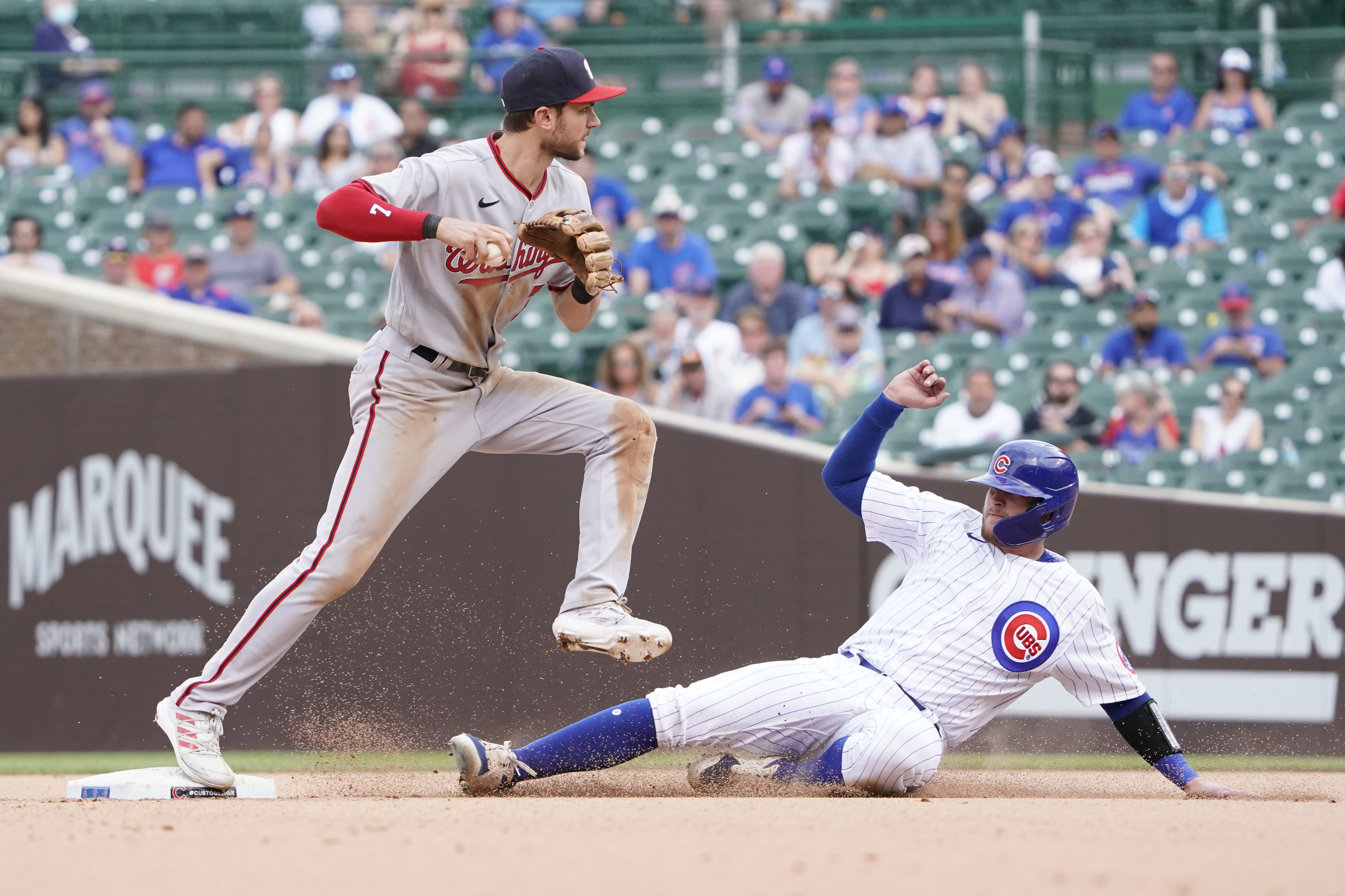 Ian Happ homers twice to lead Cubs past Nationals