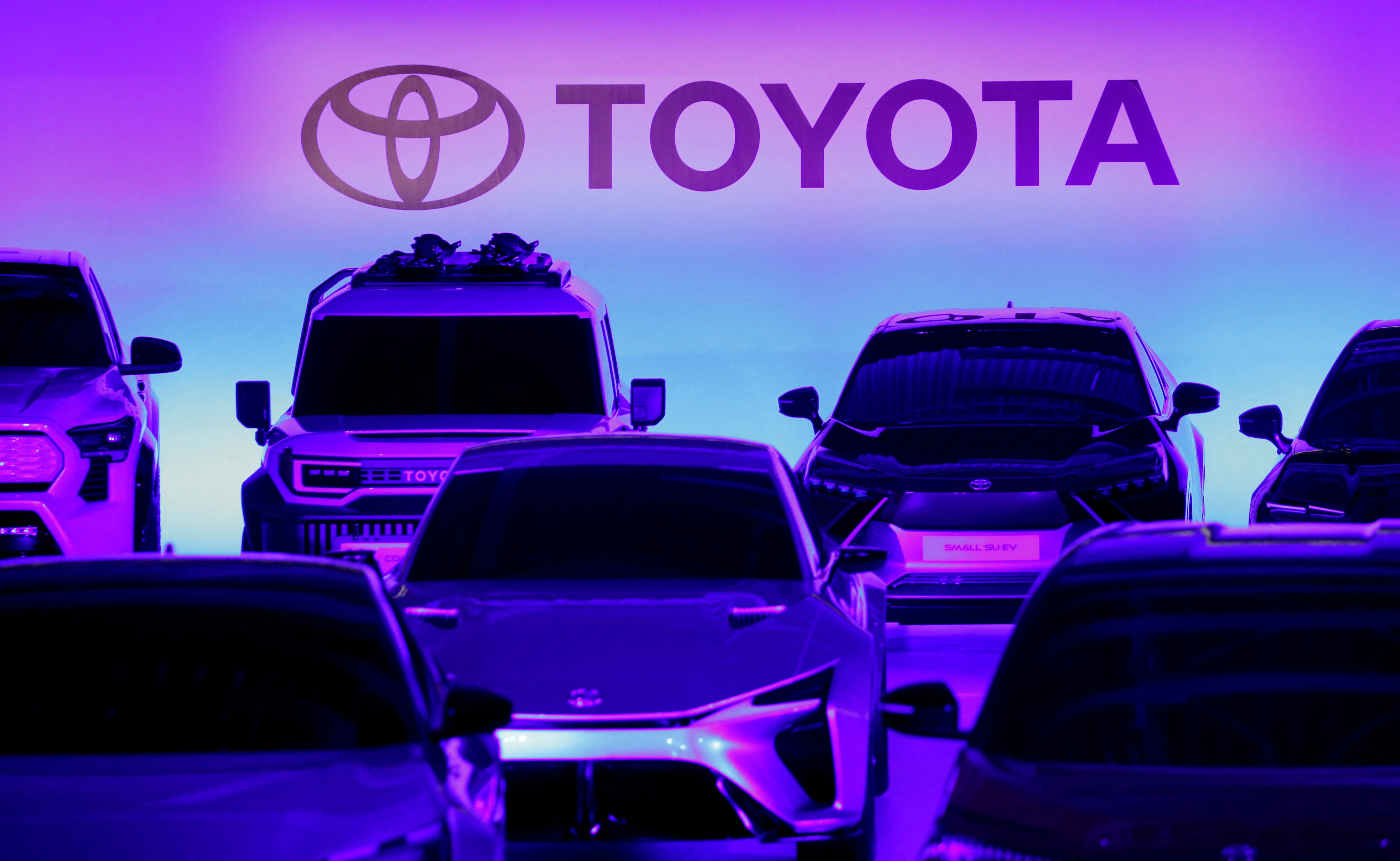 Toyota cars are seen at a briefing on the company's electric vehicle strategy