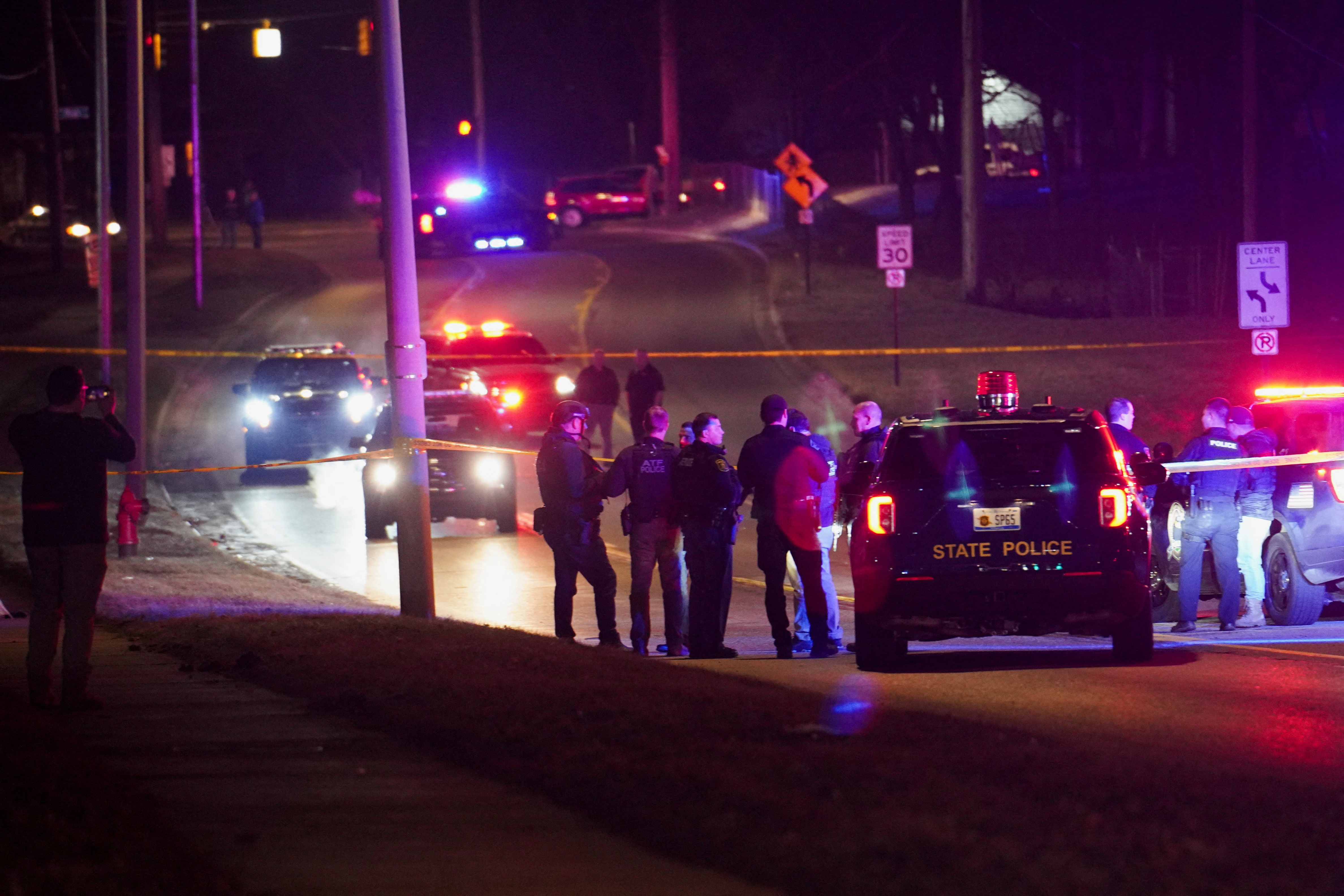 Police officers respond to a shooting at Michigan State University