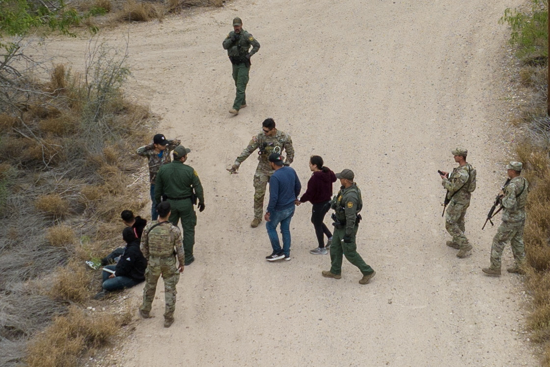 Migrants hiding in brush are detained in La Joya, Texas