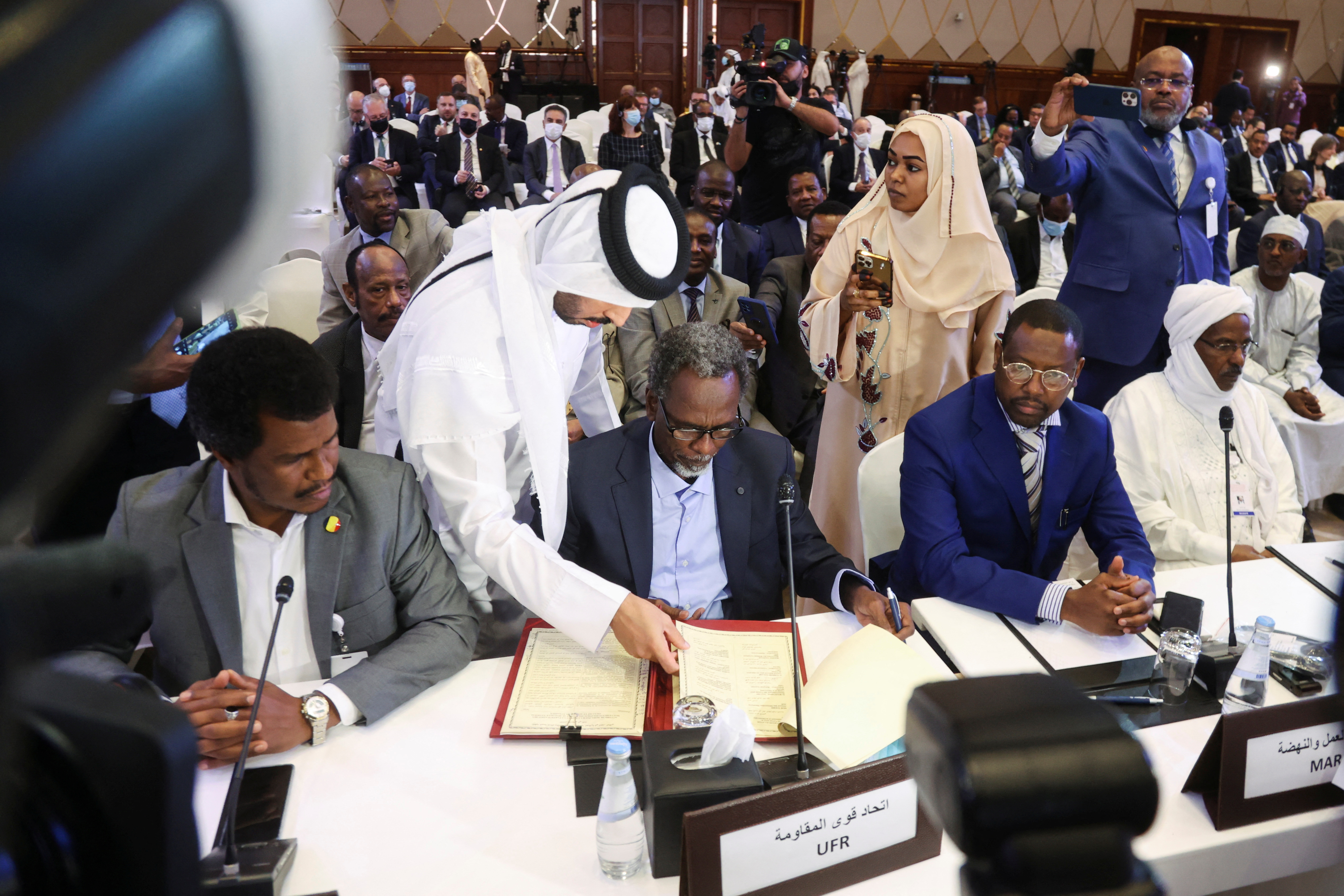Chad's transitional military authorities and rebels sign an agreement for a national dialogue, in Doha