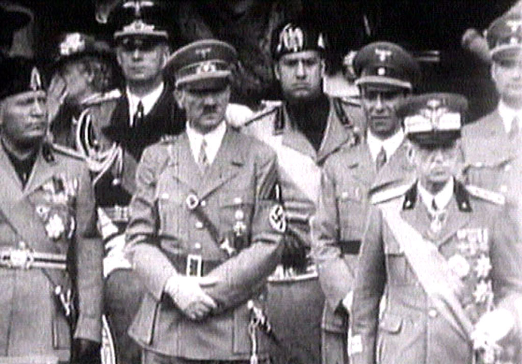 - TV PHOTO FROM 1941 - King Victor Emanuel III, (R) Adolf Hitler (C) and Benito Mussolini (L) watch ..