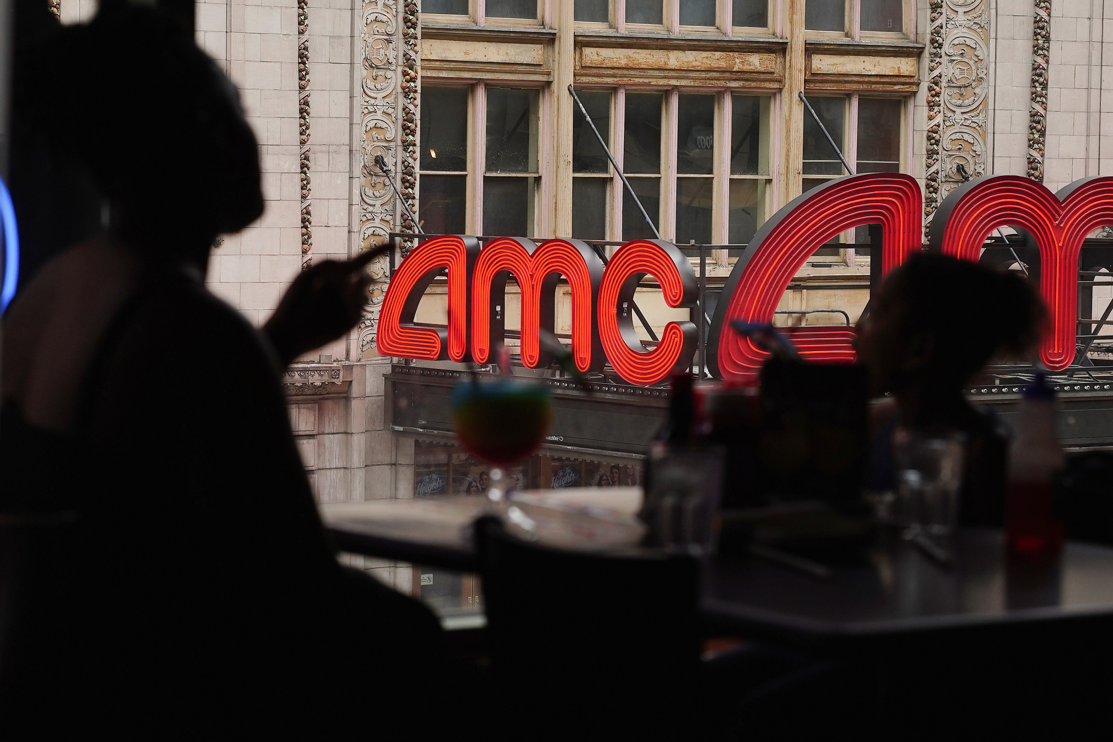 An AMC theatre is pictured in Times Square in the Manhattan borough of New York City, New York, U.S., June 2, 2021.  REUTERS/Carlo Allegri