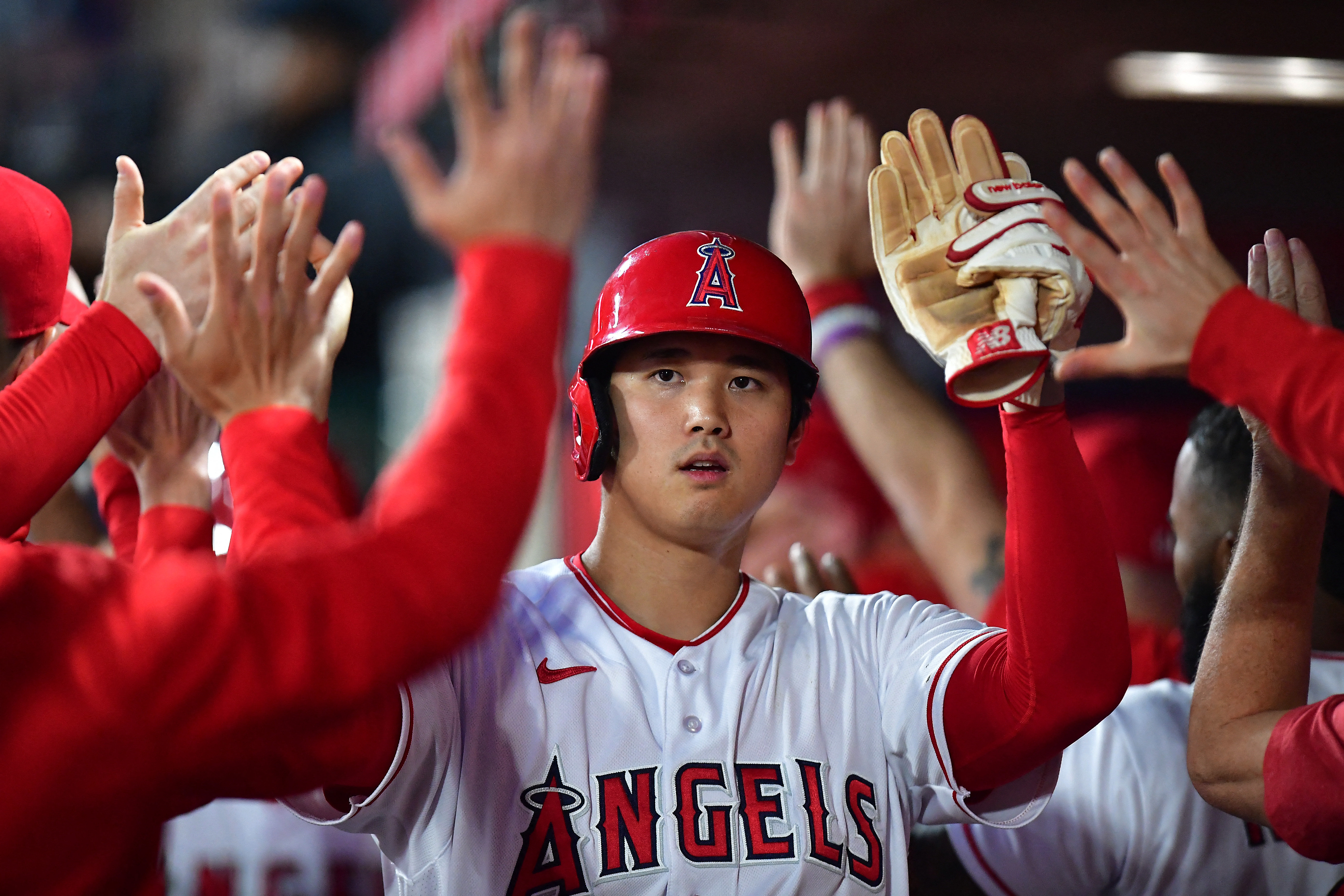 Los Angeles Angels' Shohei Ohtani rounds the bases after hitting a home run  during the fourth inning of a baseball game against the Chicago Cubs  Tuesday, June 6, 2023, in Anaheim, Calif. (