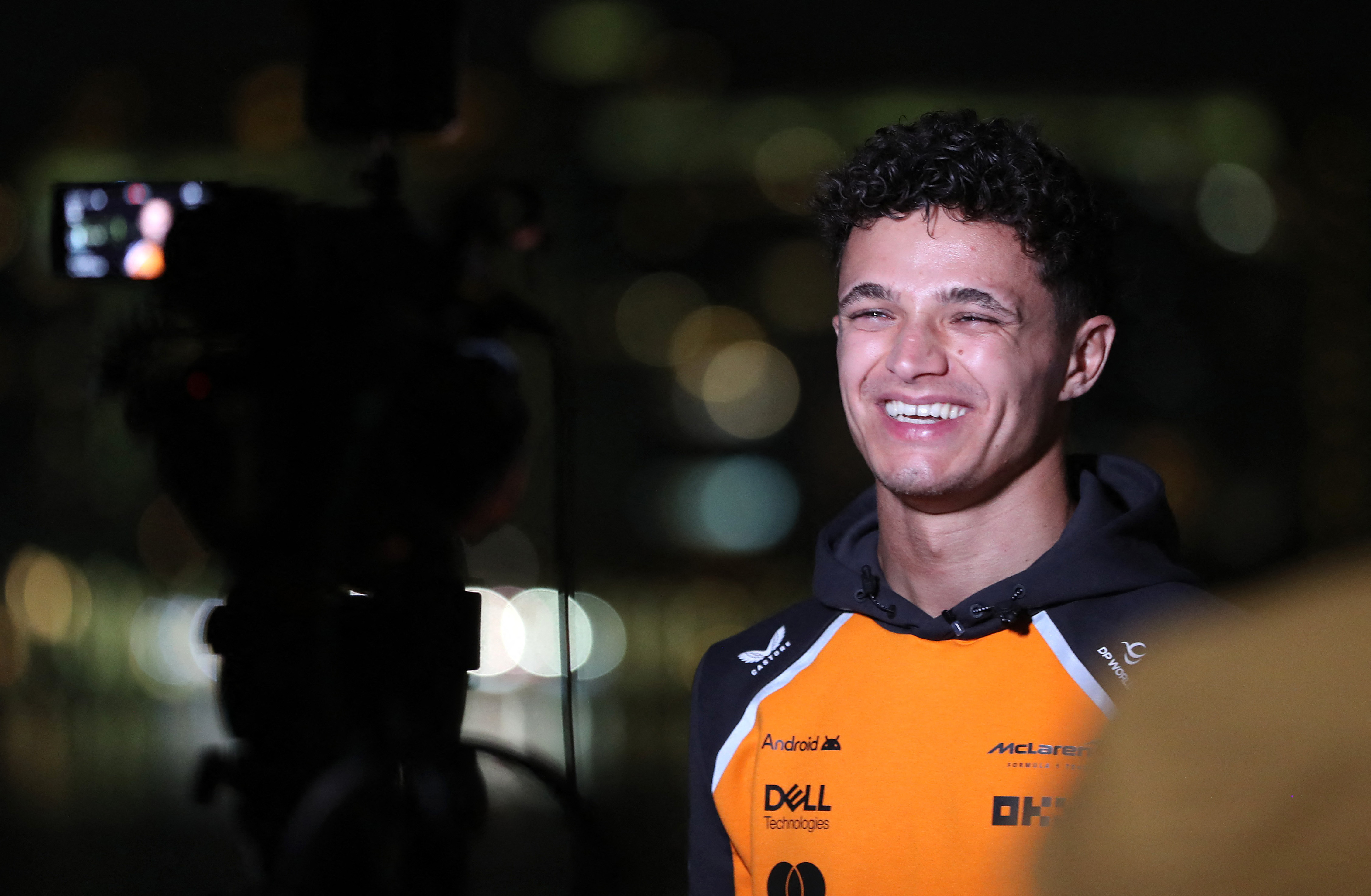 Norris gets his hands on F1 trophy as unwell Verstappen stays away