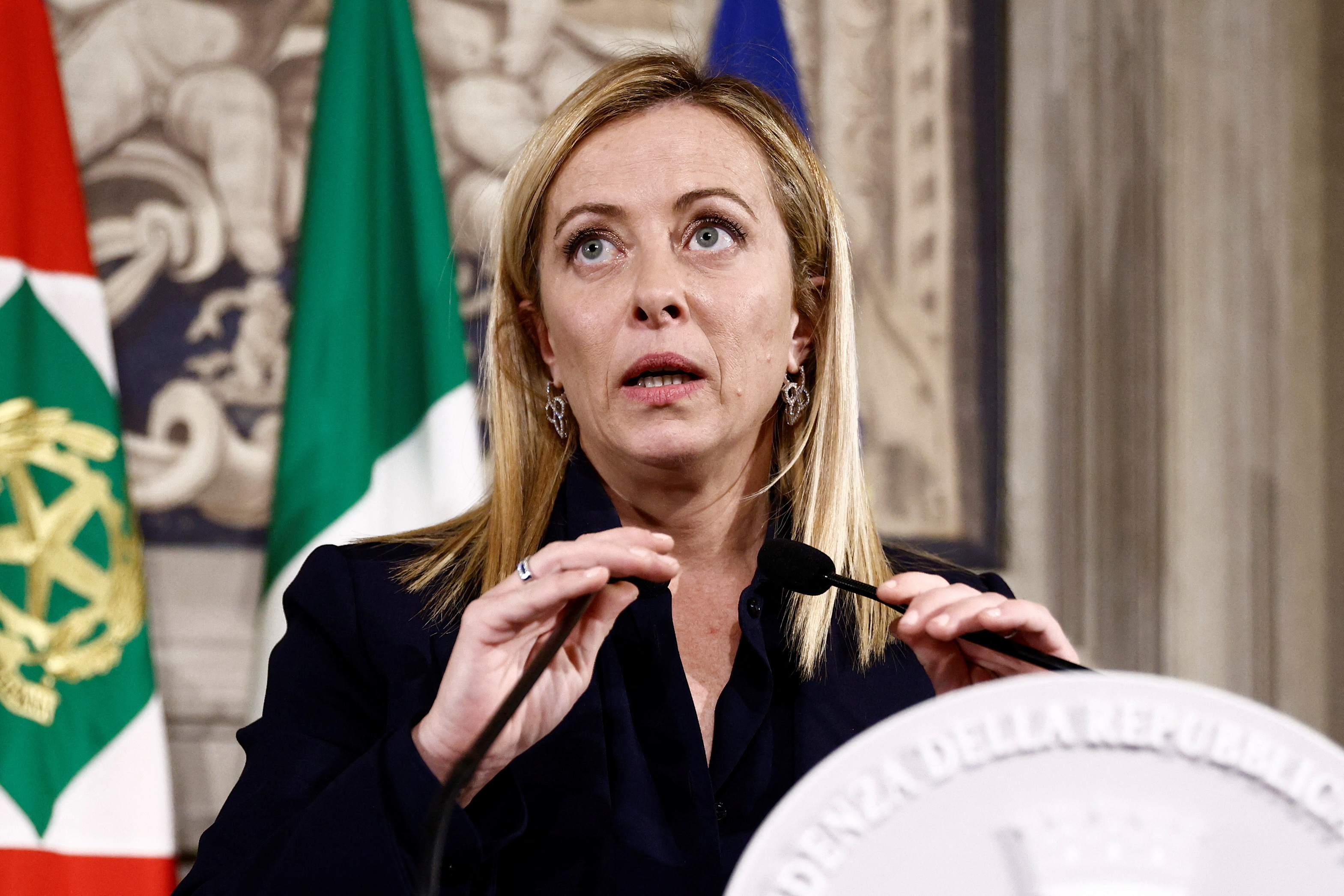 Italy's newly appointed Prime Minister Giorgia Meloni speaks to the media following a meeting with Italian President Sergio Mattarella, in Rome