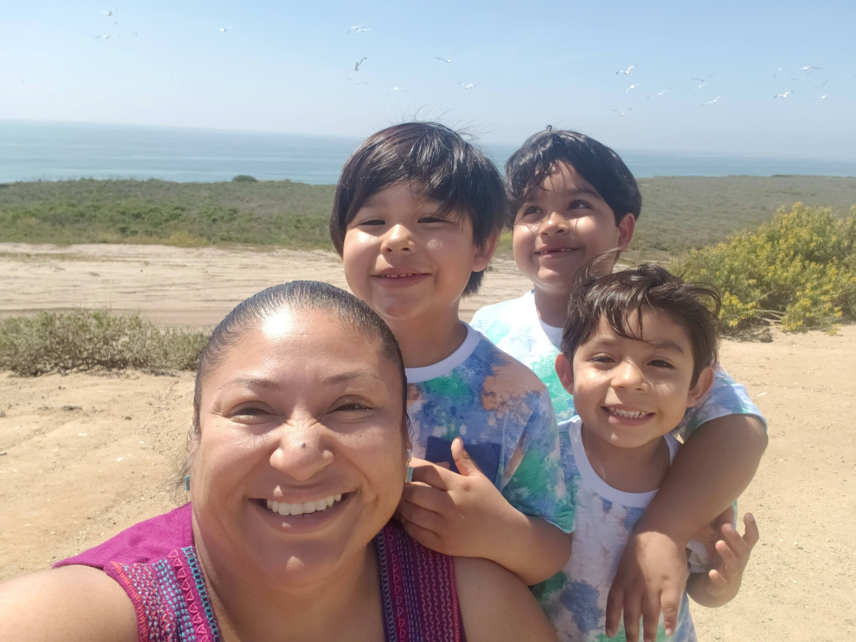 Michelle Rodriguez, 39, poses with her sons Javier Torres, 6, Johann Torres, 7, and Josue Torres 5, in San Juan Capistrano