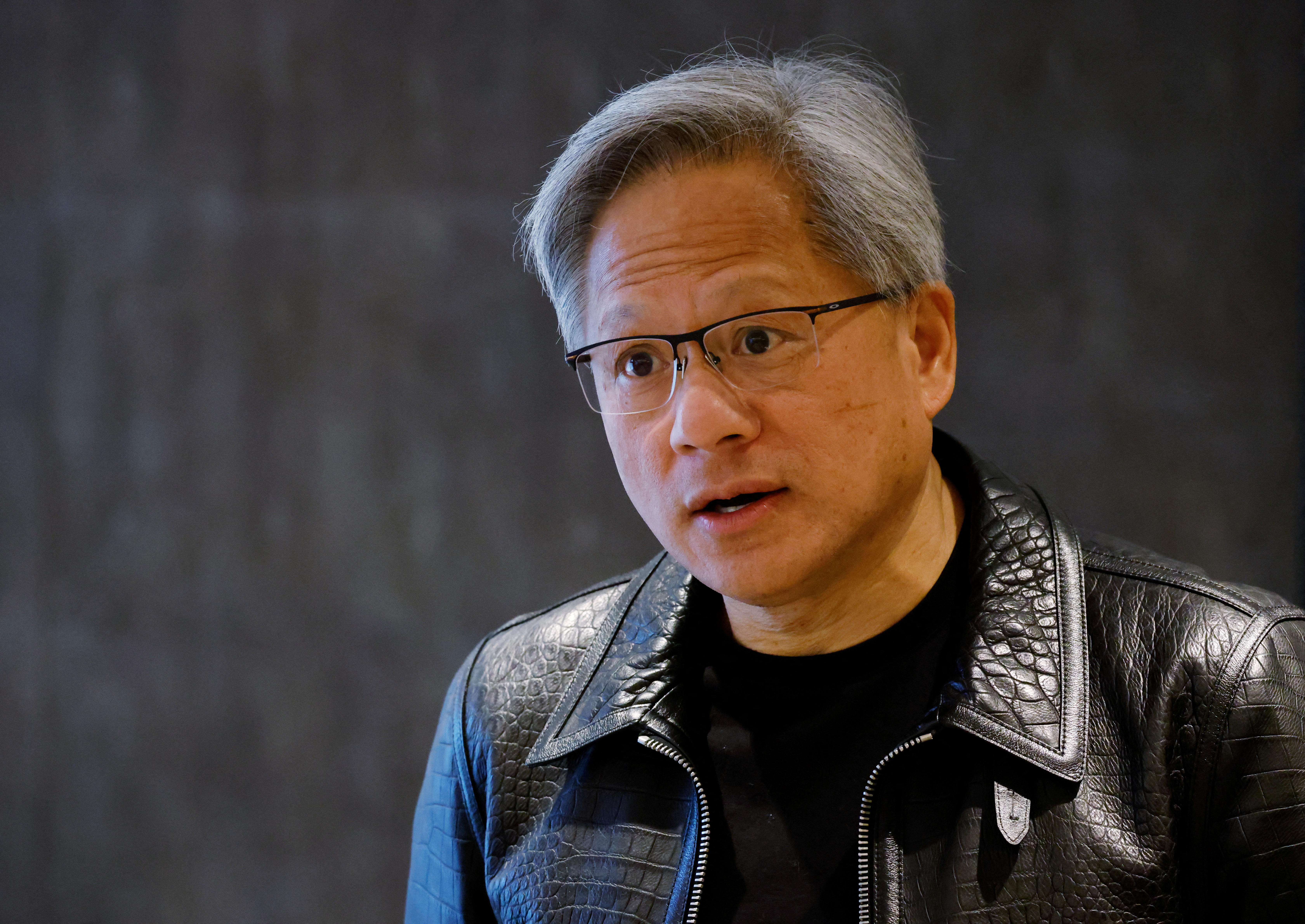NVIDIA’s CEO Jensen Huang attends a media roundtable meeting in Singapore