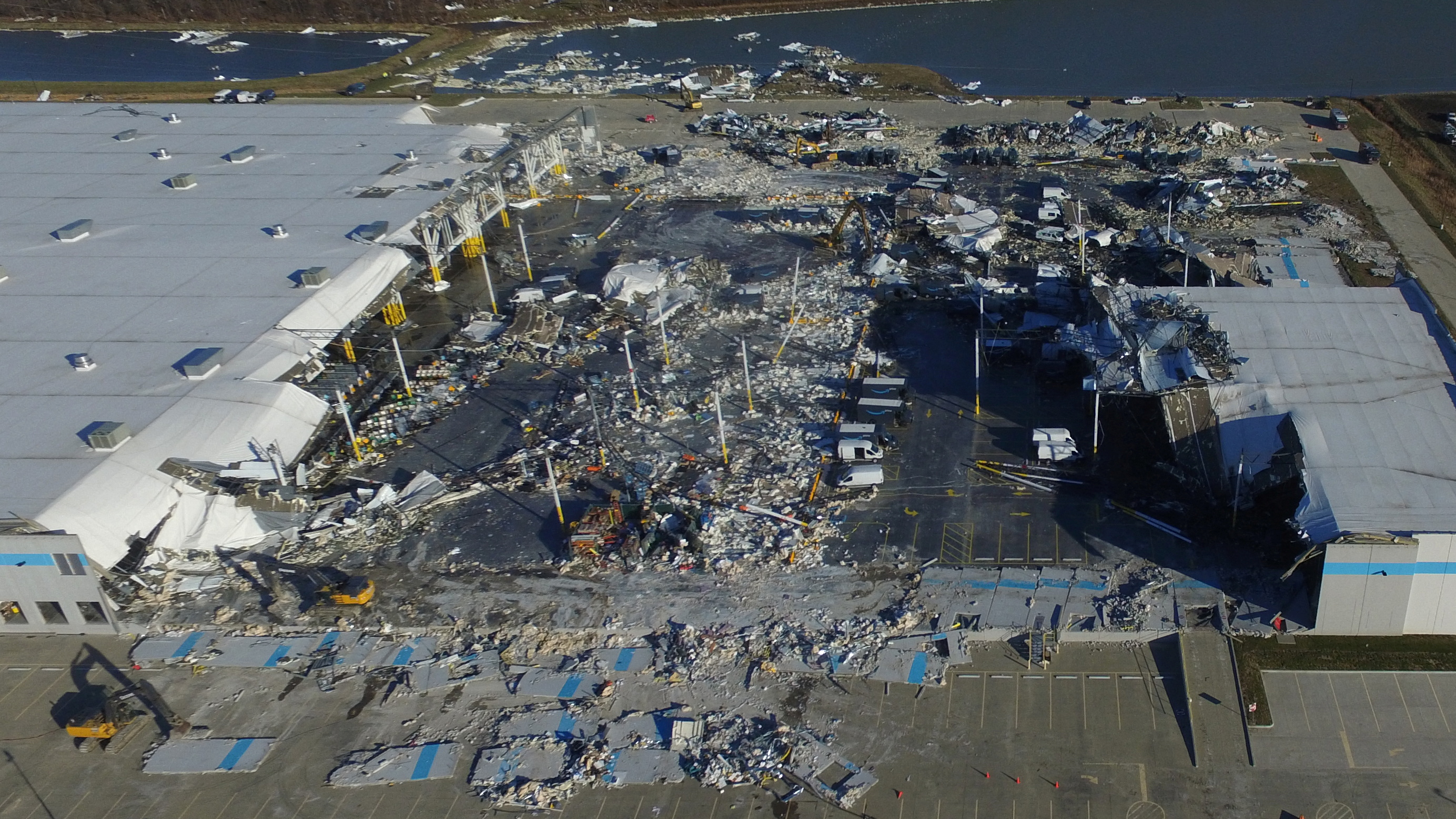 The site of a roof collapse at an Amazon.com distribution centre a day after a series of tornadoes dealt a blow to several U.S. states, in Edwardsville, Illinois, U.S. December 11, 2021.  REUTERS/Drone Base