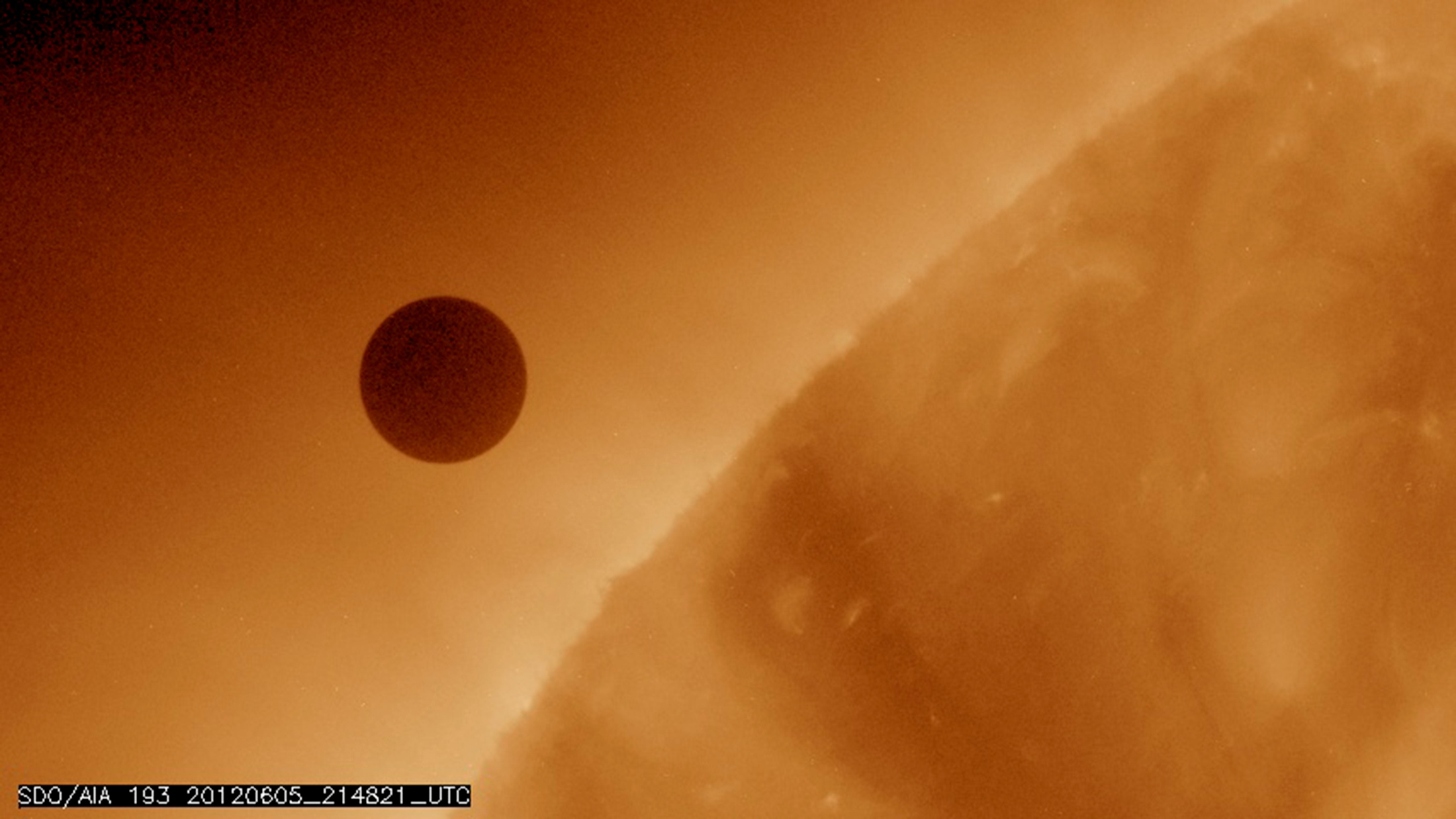 NASA image shows the planet Venus at the start of its transit of the Sun