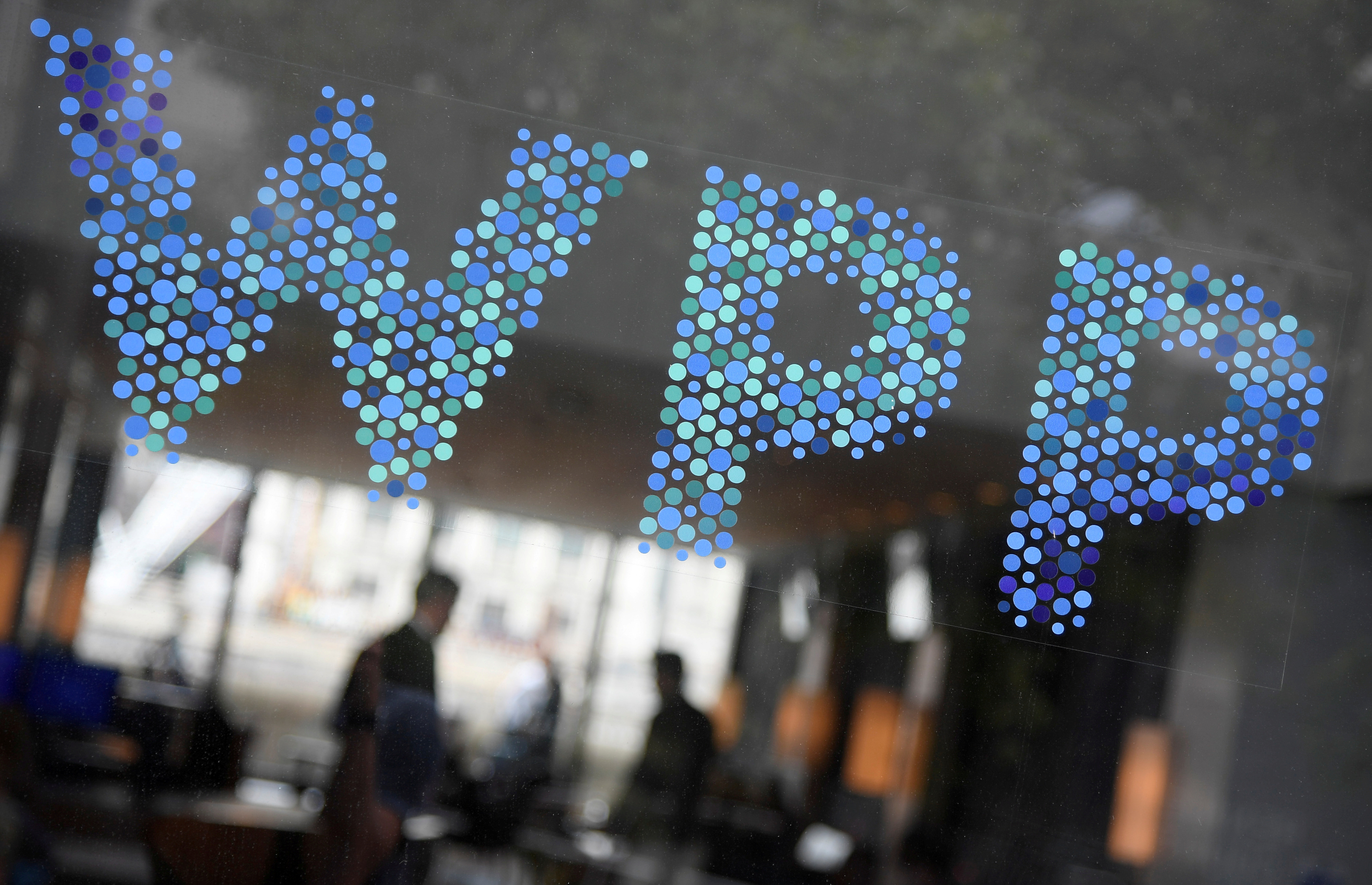 Branding signage is seen for WPP, the world's biggest advertising and marketing company, at their offices in London