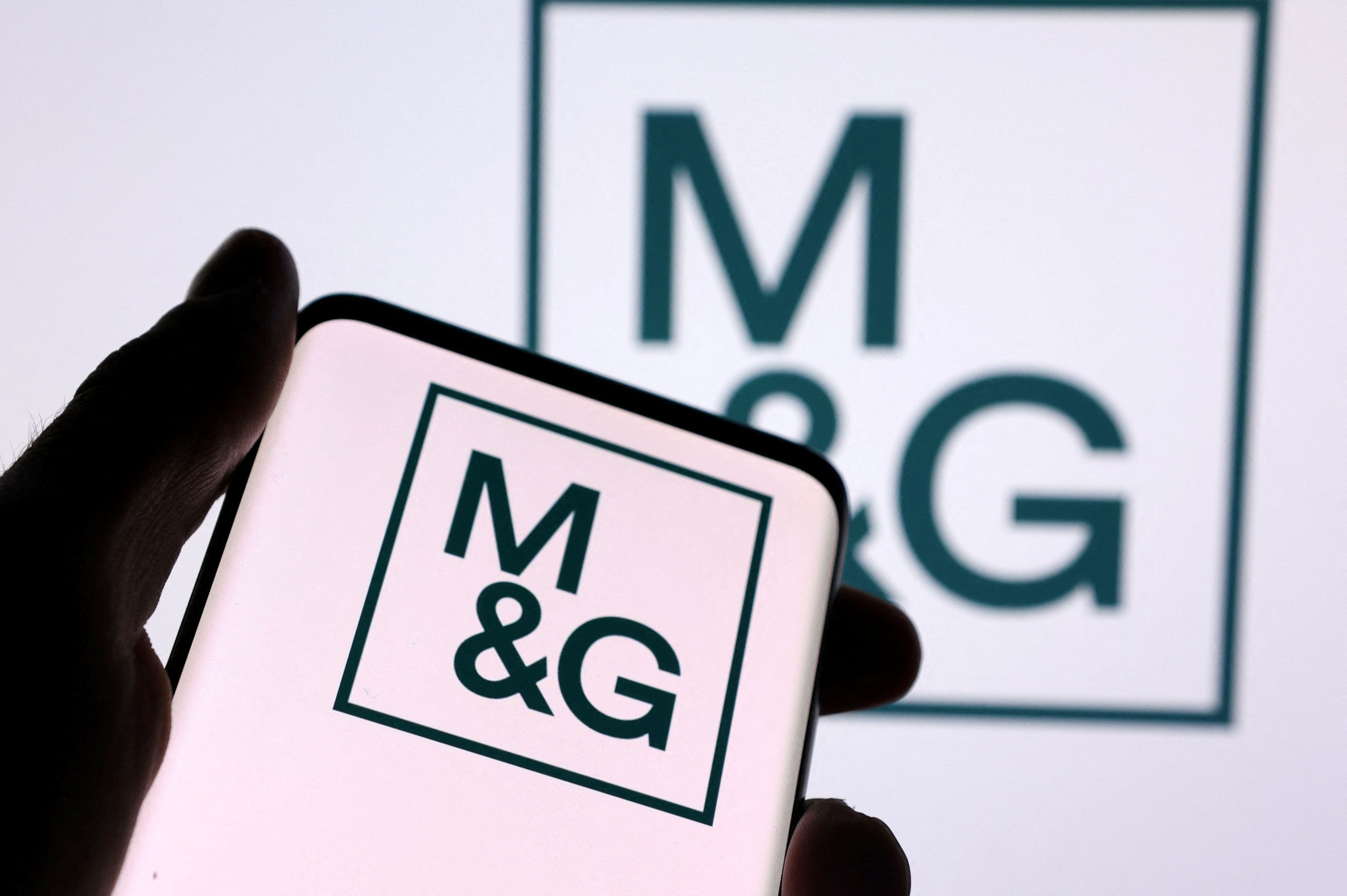 Illustration shows a smartphone with displayed M&G plc logo