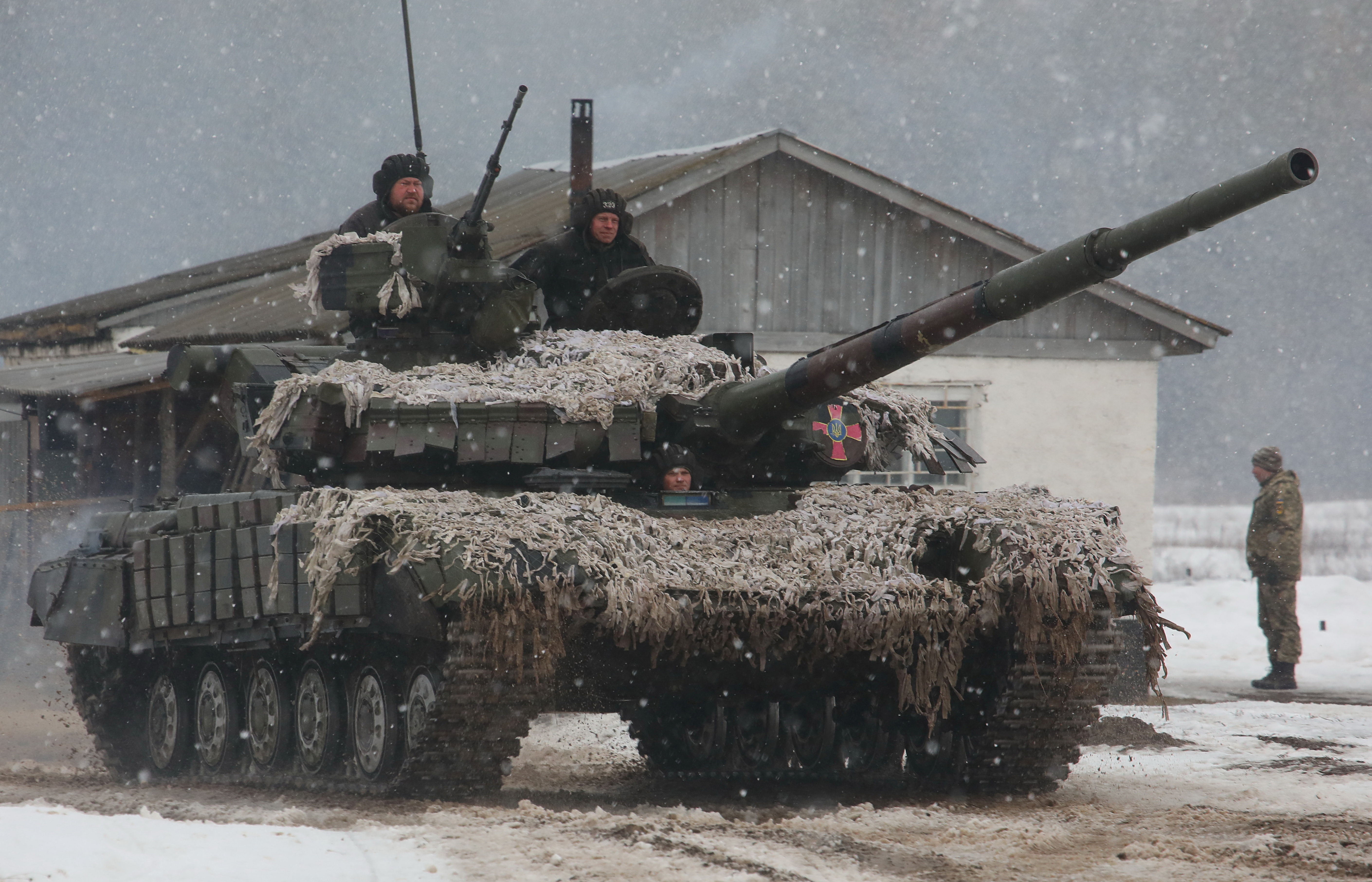 Ukrainian servicemen take part in military drills in Kharkiv region