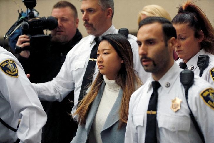 Inyoung You, a former Boston College student from South Korea, leaves court after being arraigned on involuntary manslaughter charges in connection with the suicide of her boyfriend, in Suffolk County Superior Court in Boston, Massachusetts, U.S., November 22, 2019.  REUTERS/Katherine Taylor