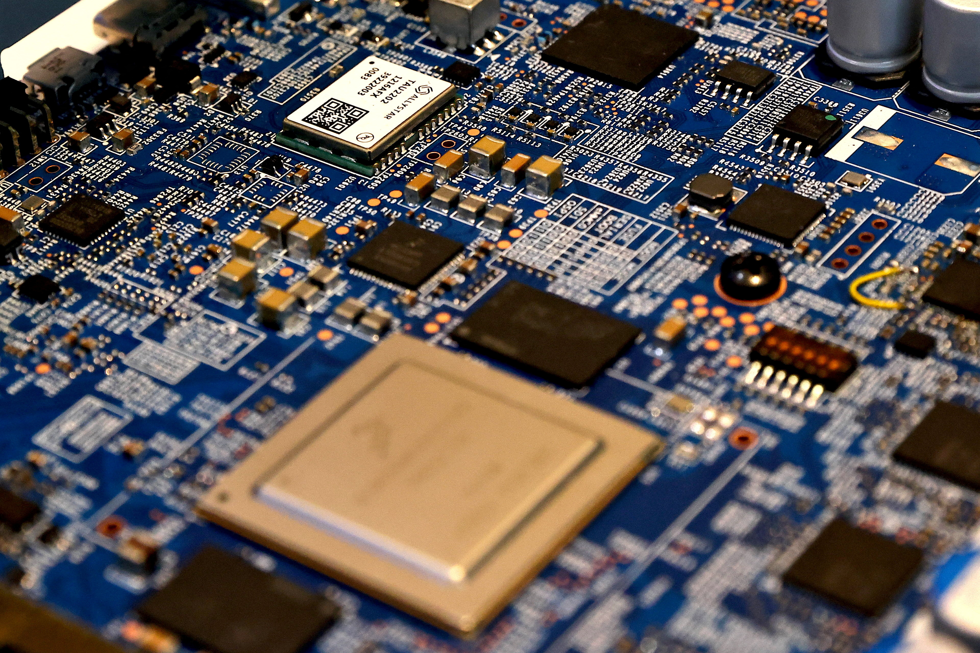 A printed circuit board is displayed at Foxconn's EV development platform MIH demo day, in Taipei