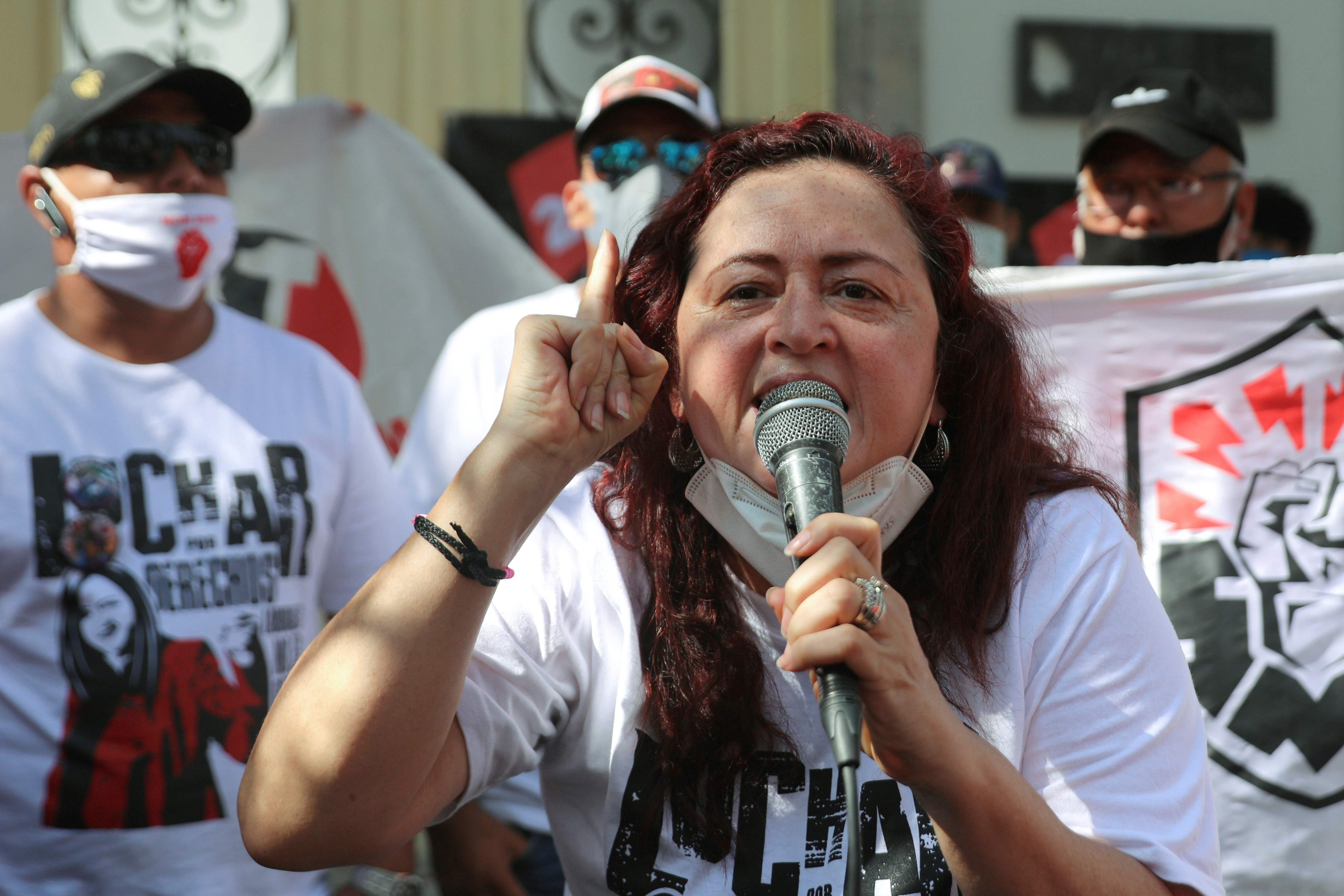 Mexican labor lawyer Susana Prieto leads a demonstration with supporters and workers outside an office of the Chihuahua state government in Mexico City
