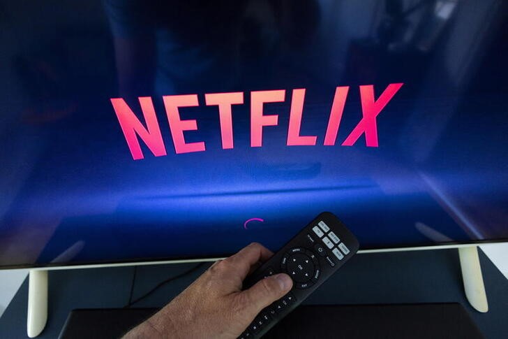 A Netflix logo is shown on a TV screen ahead of a Swiss vote, in this illustration