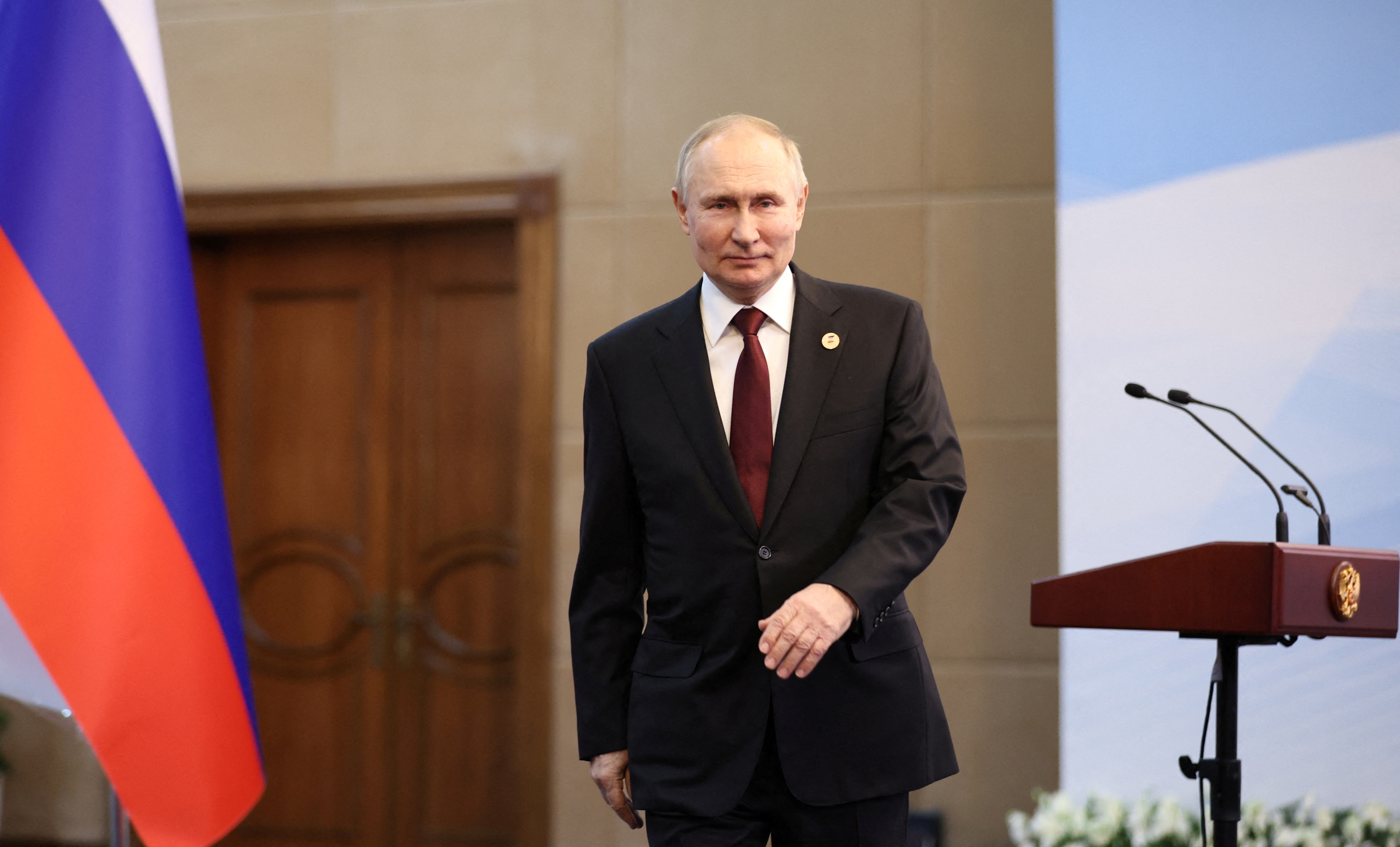 Russian President Putin attends a news conference in Bishkek
