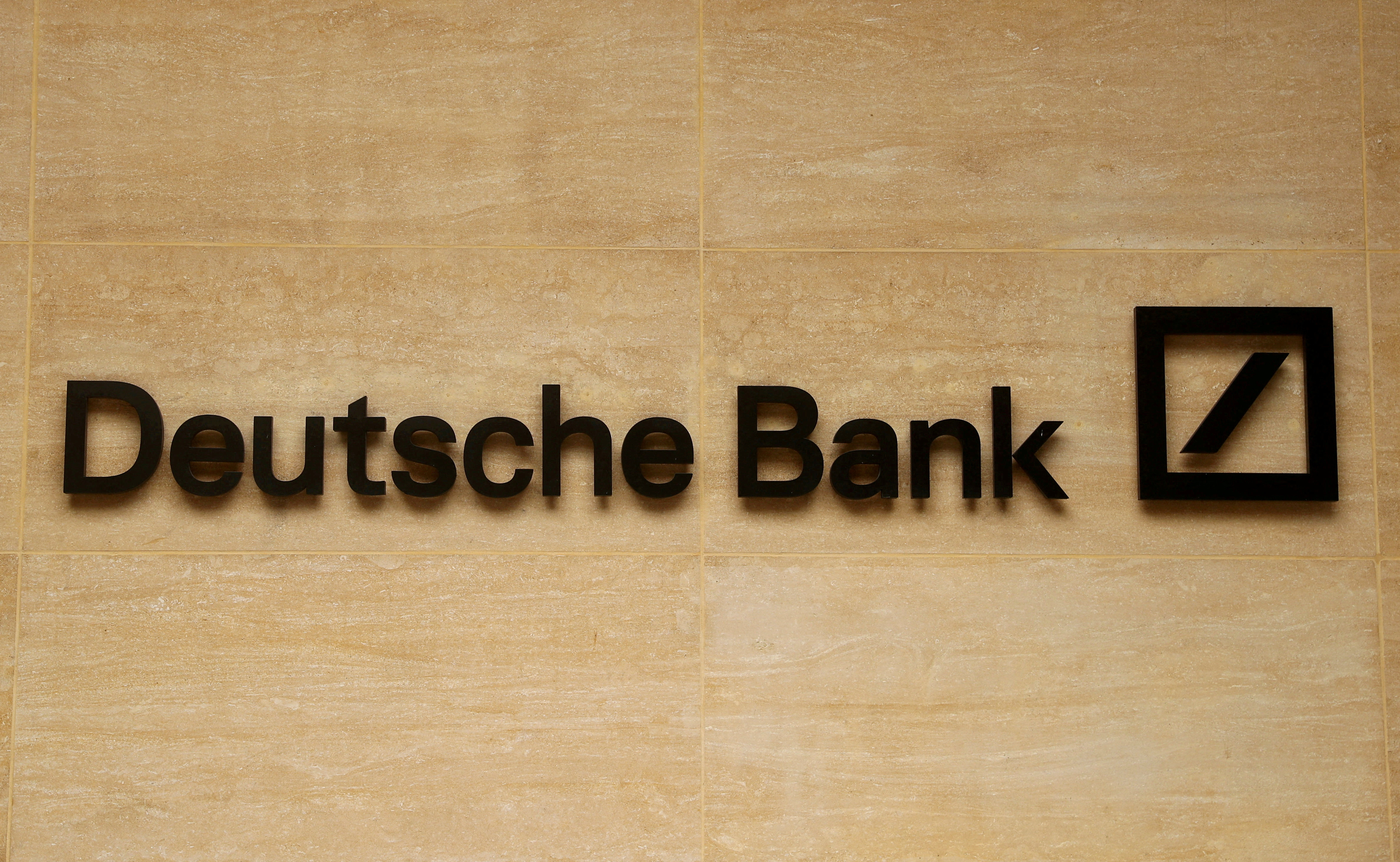 The logo of Deutsche Bank is pictured on an office of the company in London, Britain