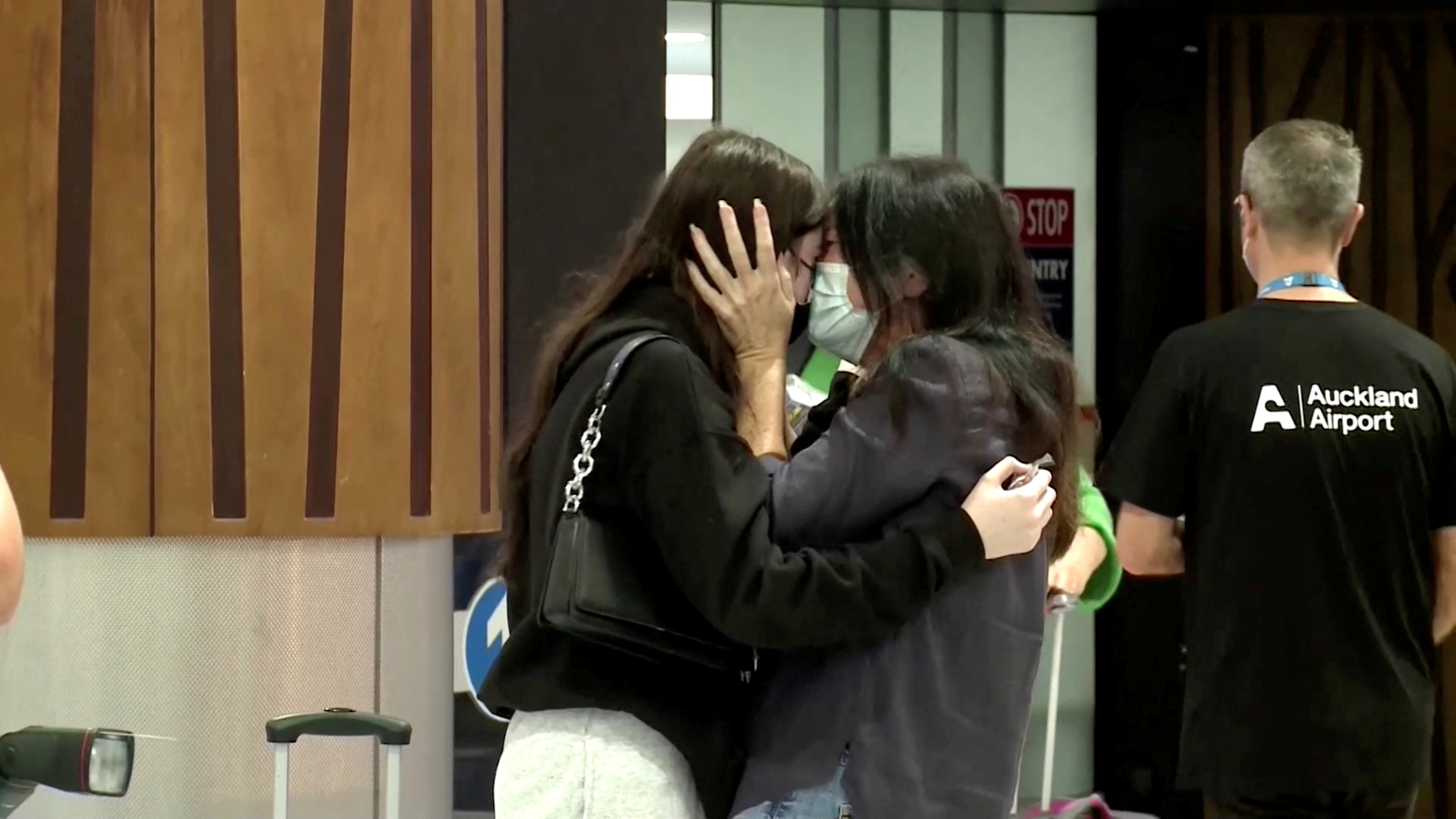 Emotional scenes at Auckland airport as New Zealand welcomes Australian visitors