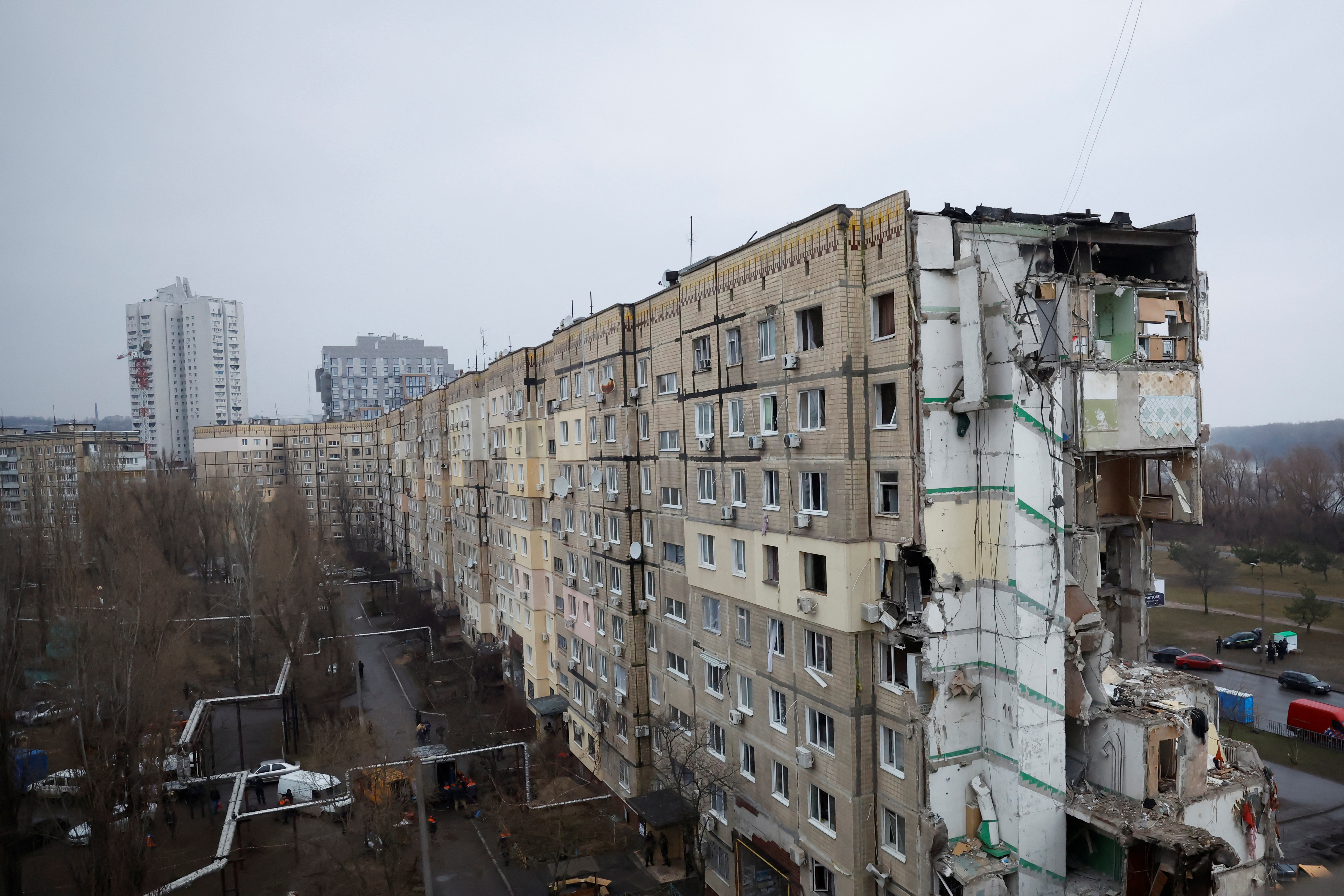 Aftermath of Dnipro apartment block destruction following missile strike