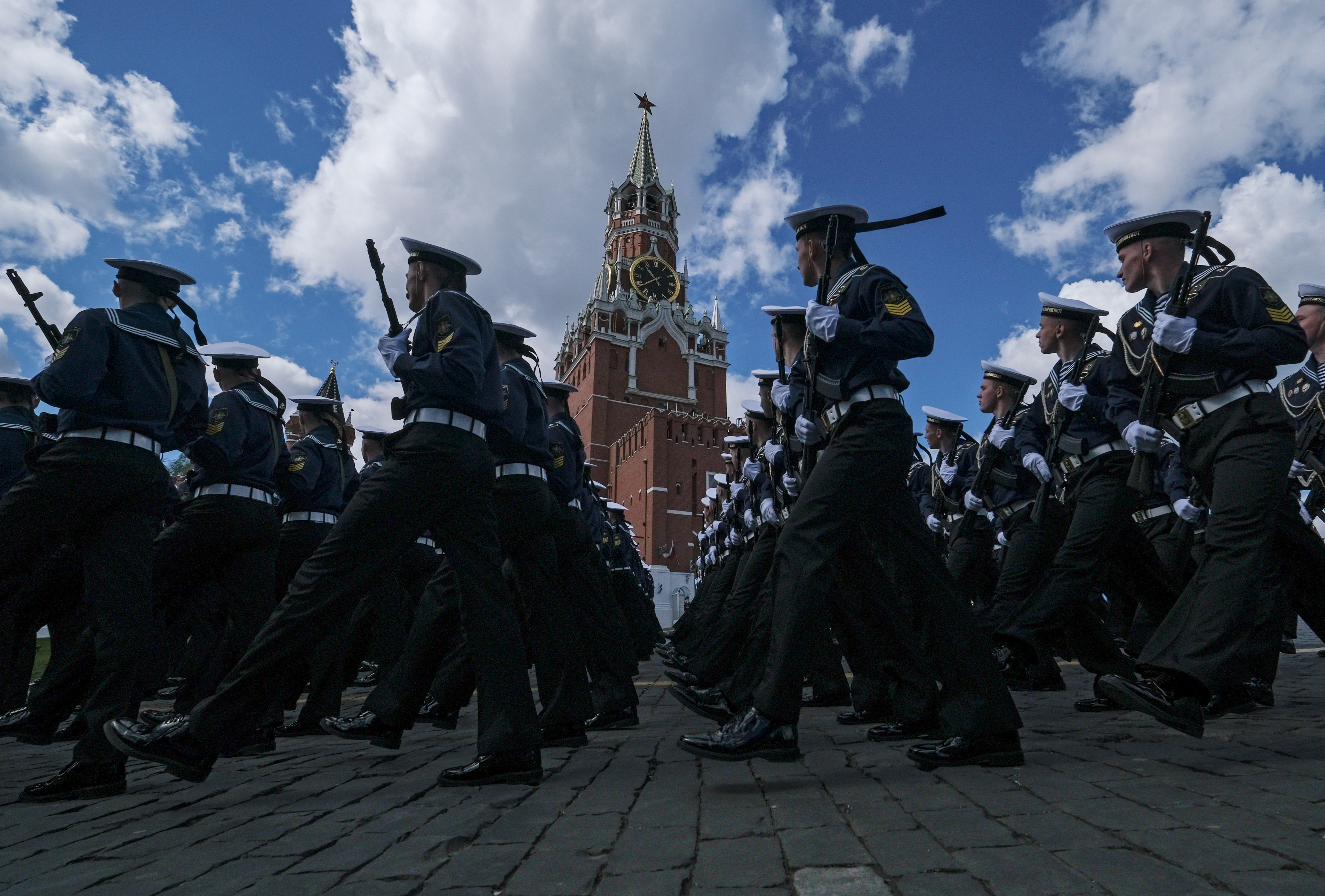 Russian servicemen march during a rehearsal for the Victory Day military parade in Moscow