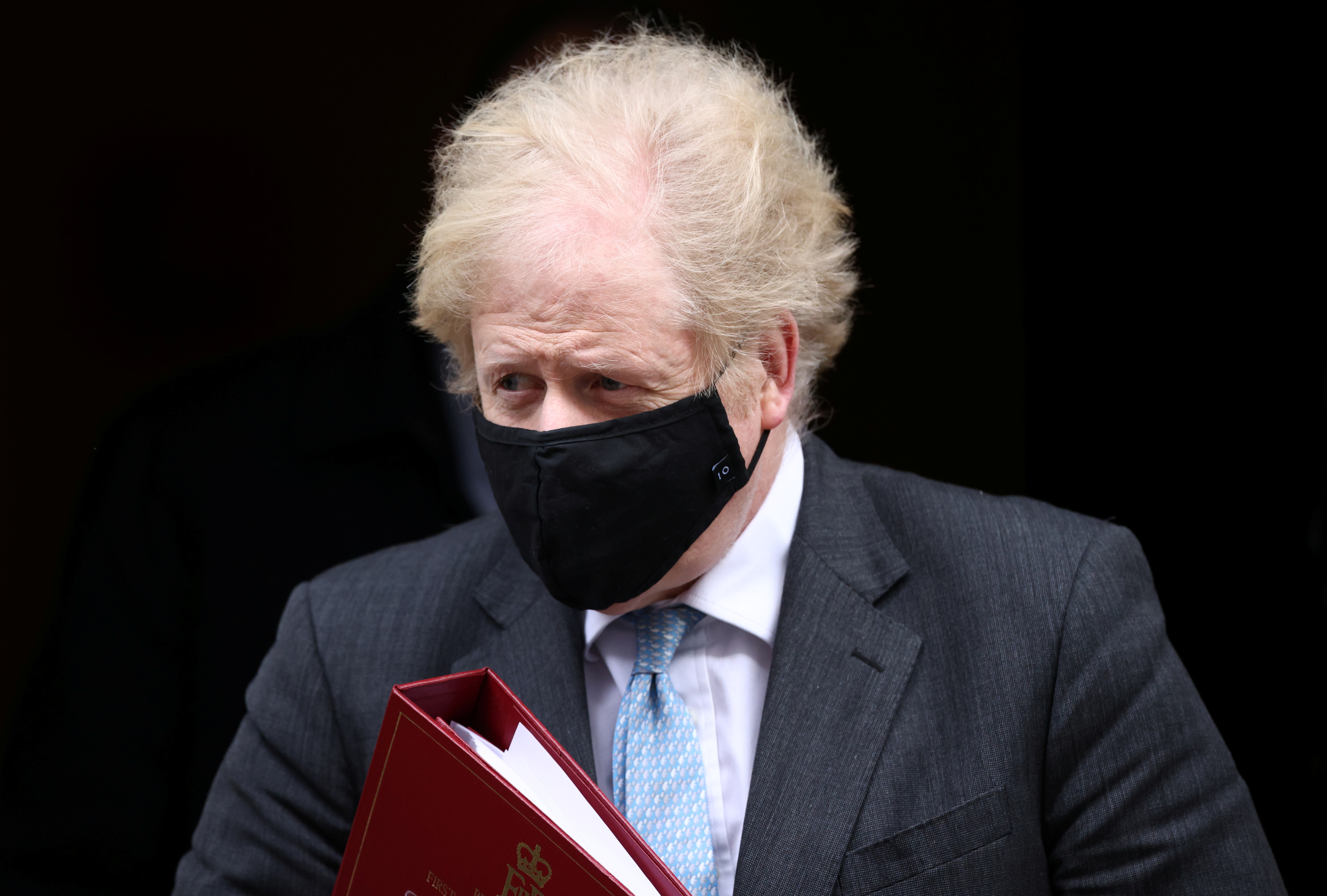 Britain's Prime Minister Boris Johnson leaves Downing Street in London, Britain, February 10, 2021. REUTERS/Henry Nicholls