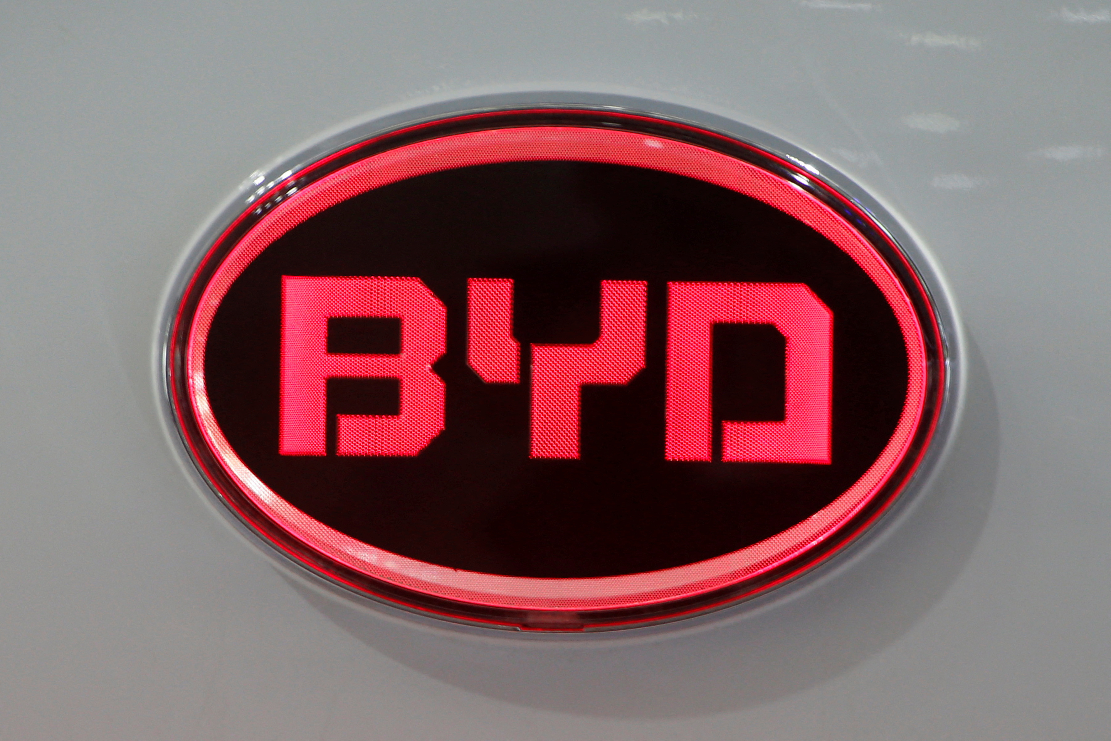 The BYD logo is pictures on its Qin EV300 model during the Auto China 2016 auto show in Beijing