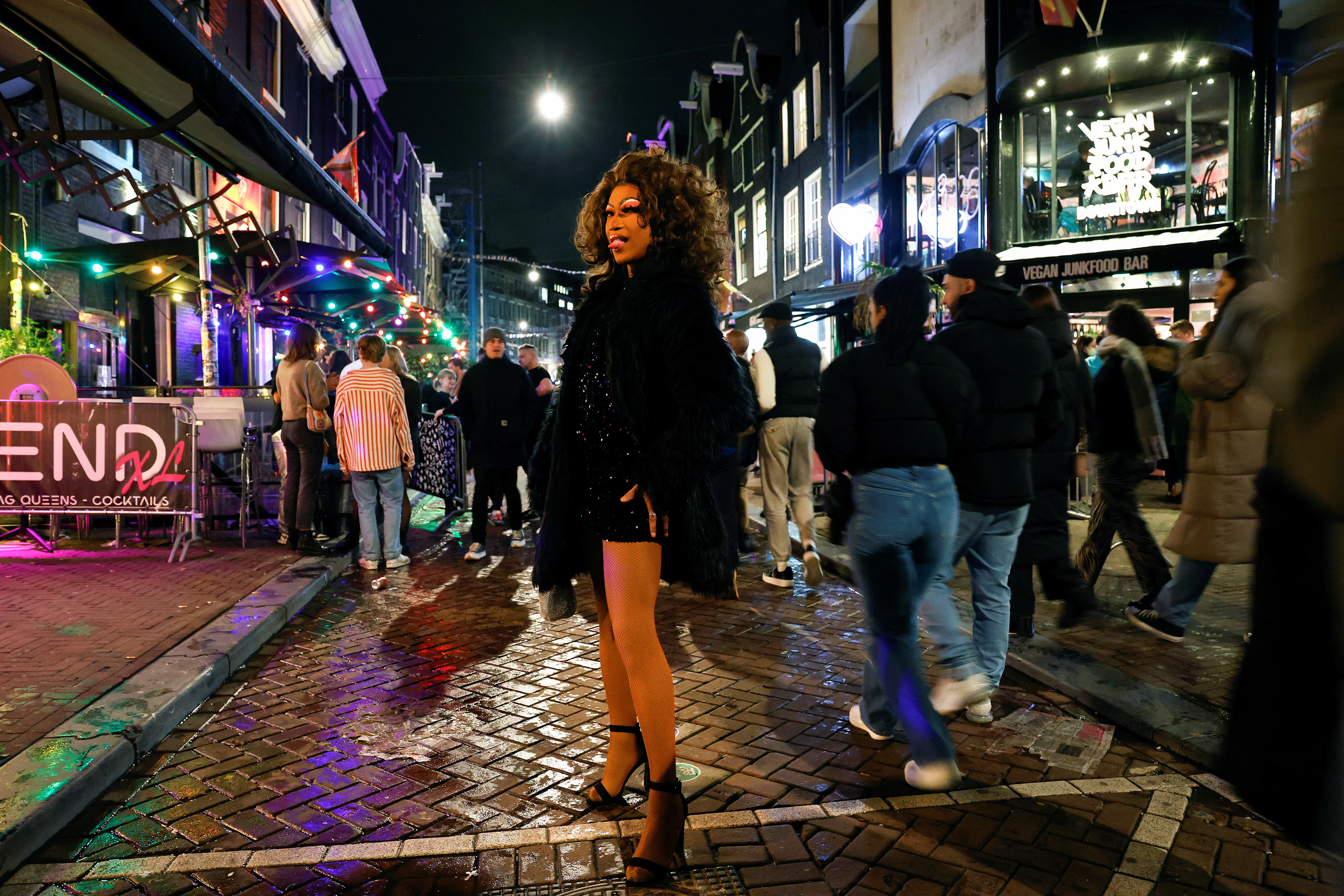 people walking at night