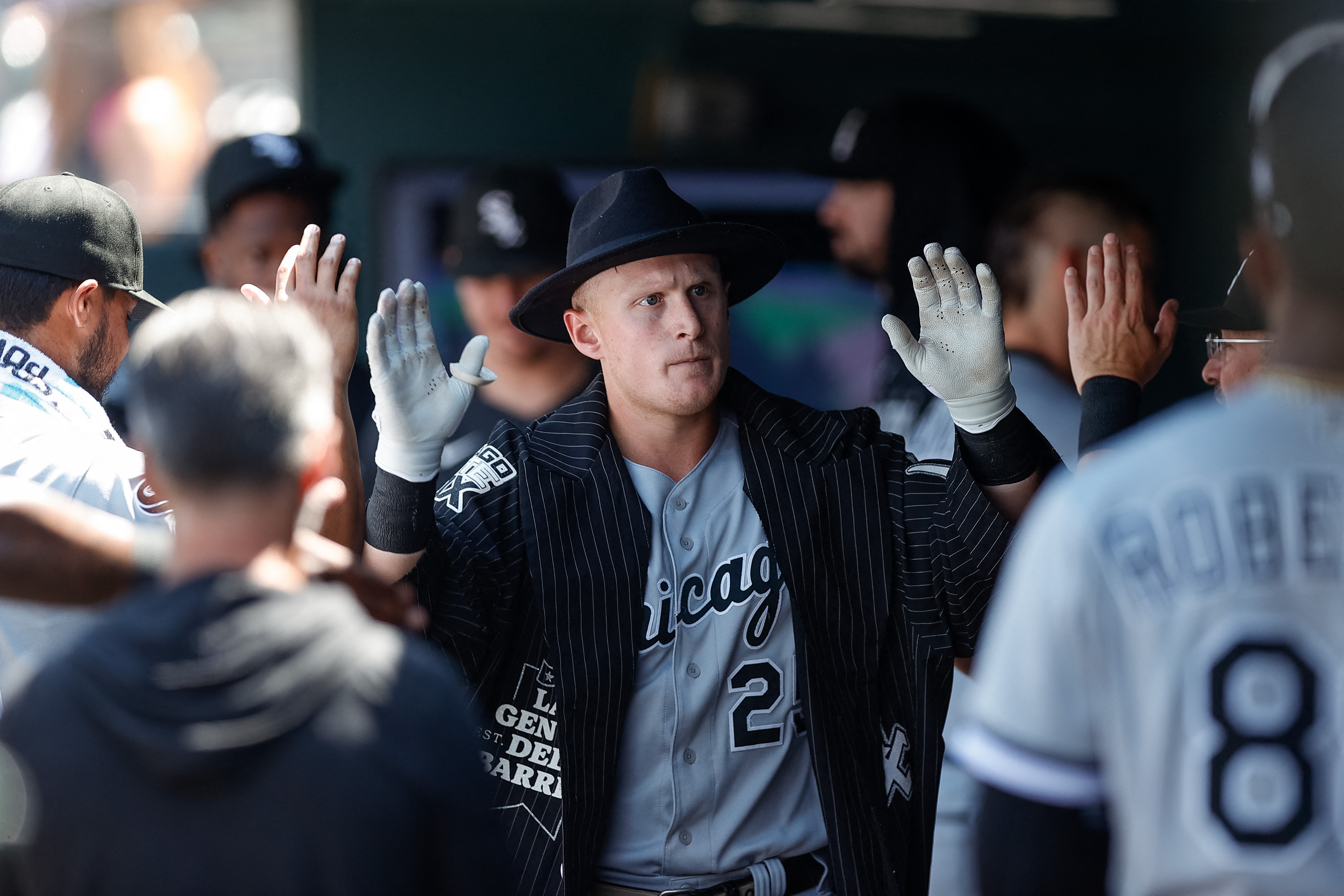 Chicago White Sox third baseman Yoan Moncada (10) swings at the pitch in an  MLB baseball game against the Colorado Rockies, Sunday, Aug. 20, 2023. The  White Sox defeated the Rockies 10-5