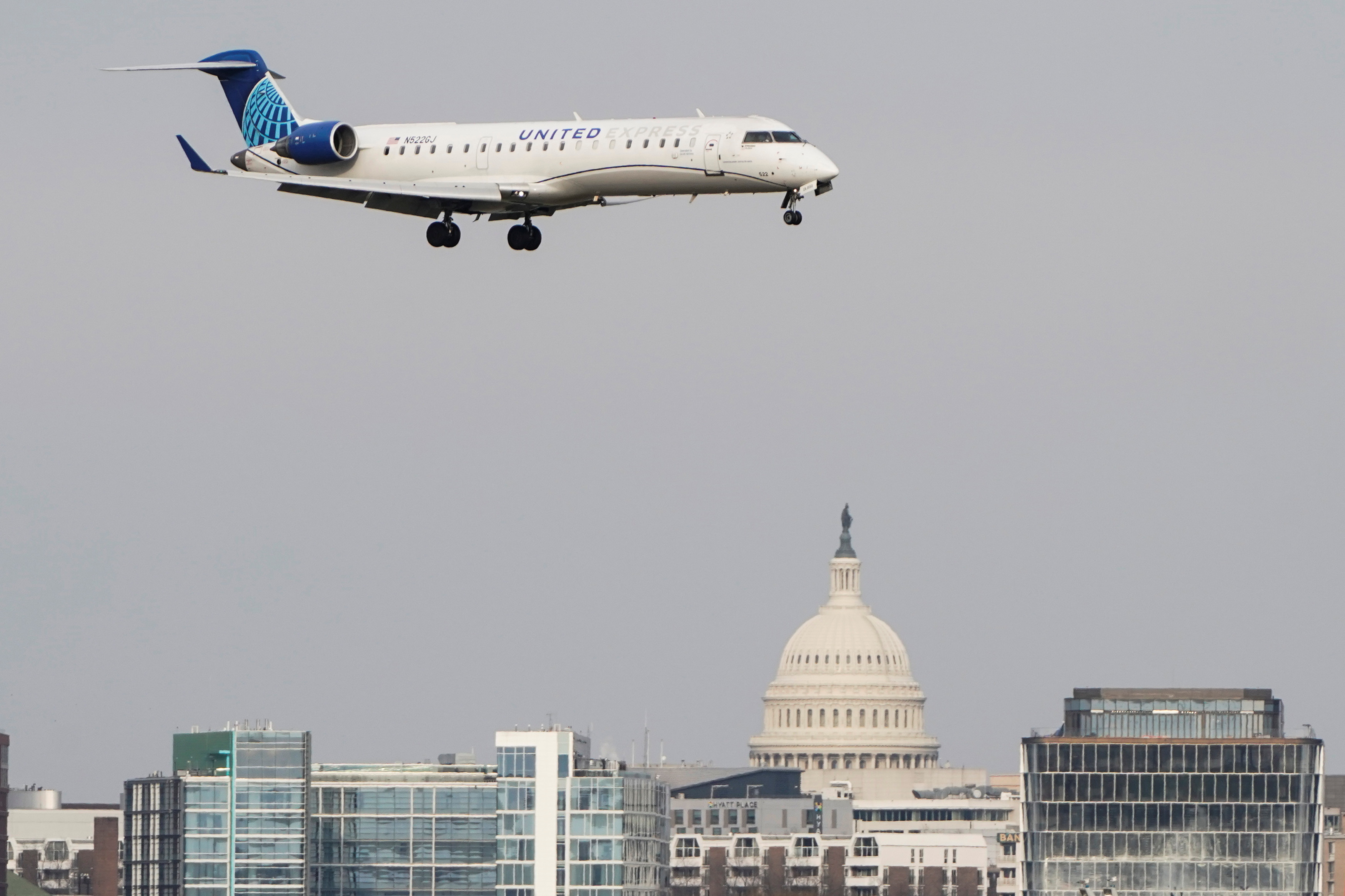 A United Airlines aircraft lands at Reagan National Airport in Arlington, Virginia