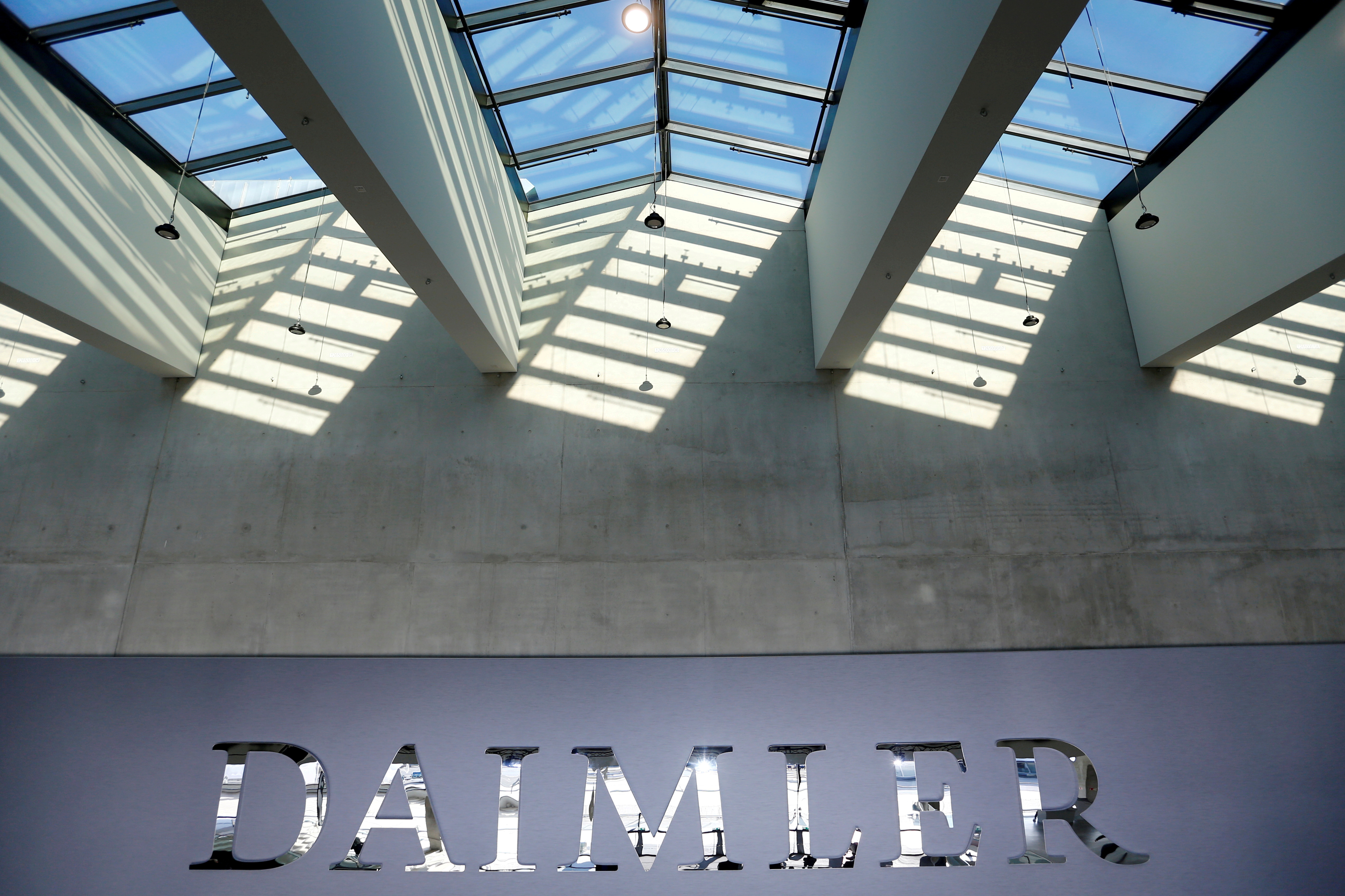 The Daimler logo is seen before the carmaker's annual shareholder meeting in Berlin