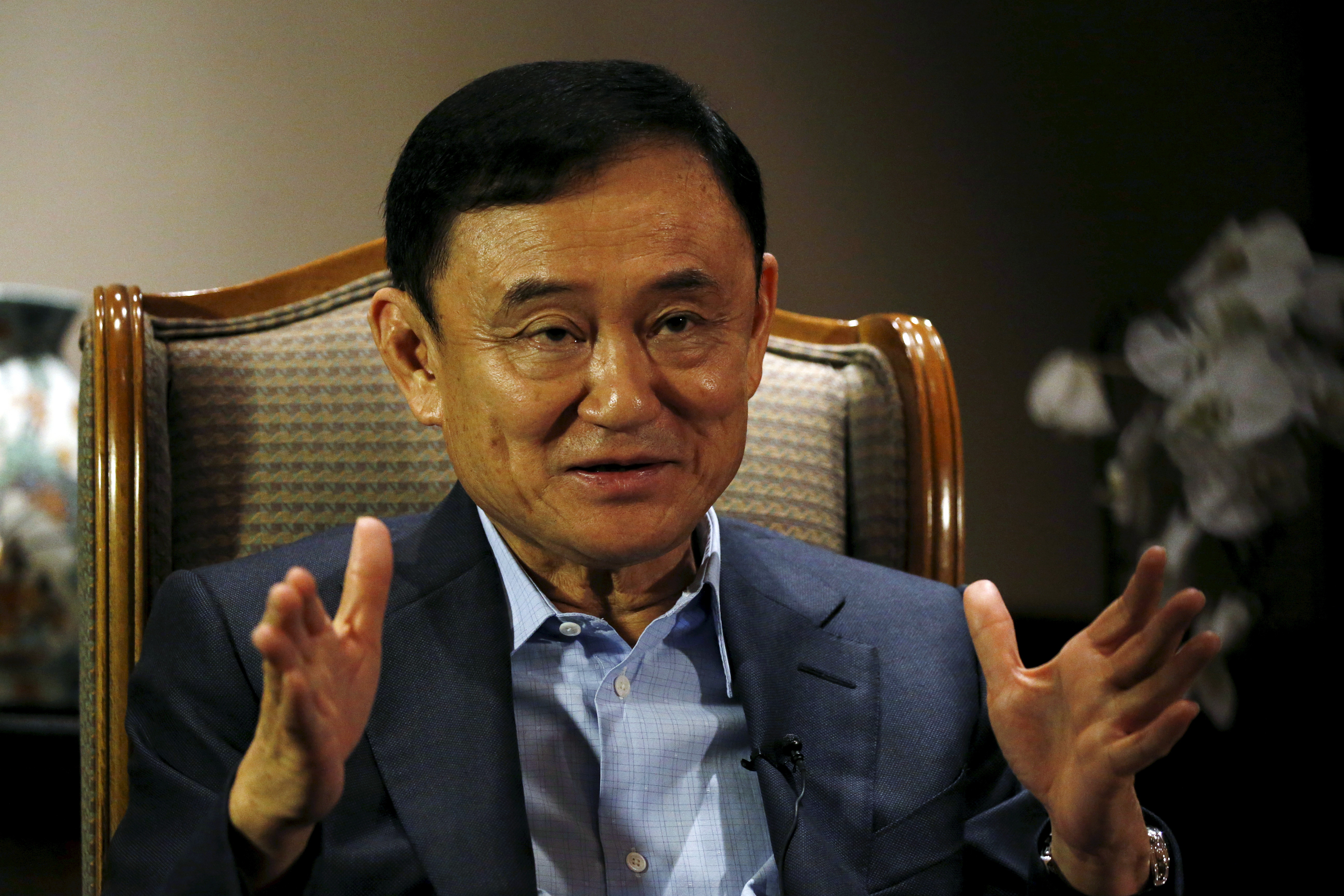 Thailand's ex-PM Thaksin shakes up election with talk of return | Reuters