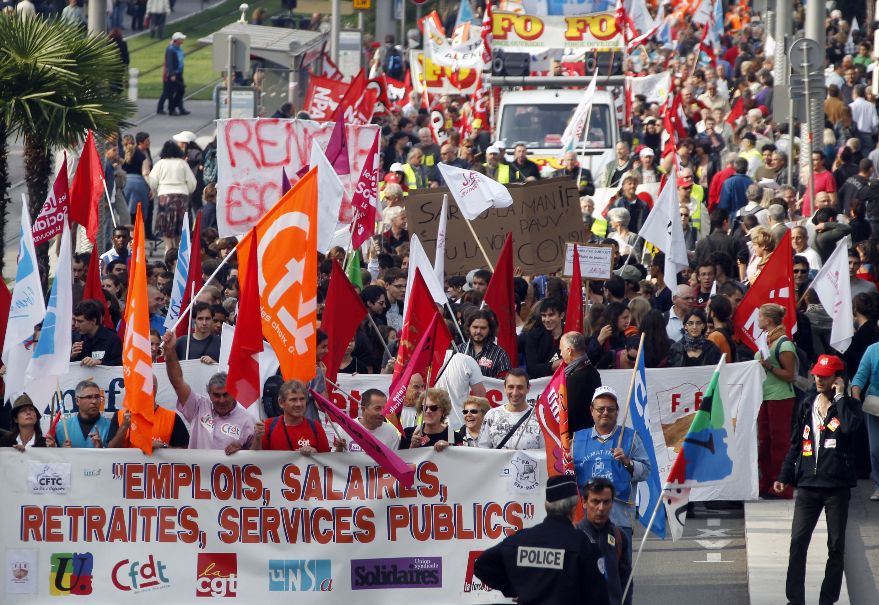Private and public sector workers demonstrate over pension reforms in Nice