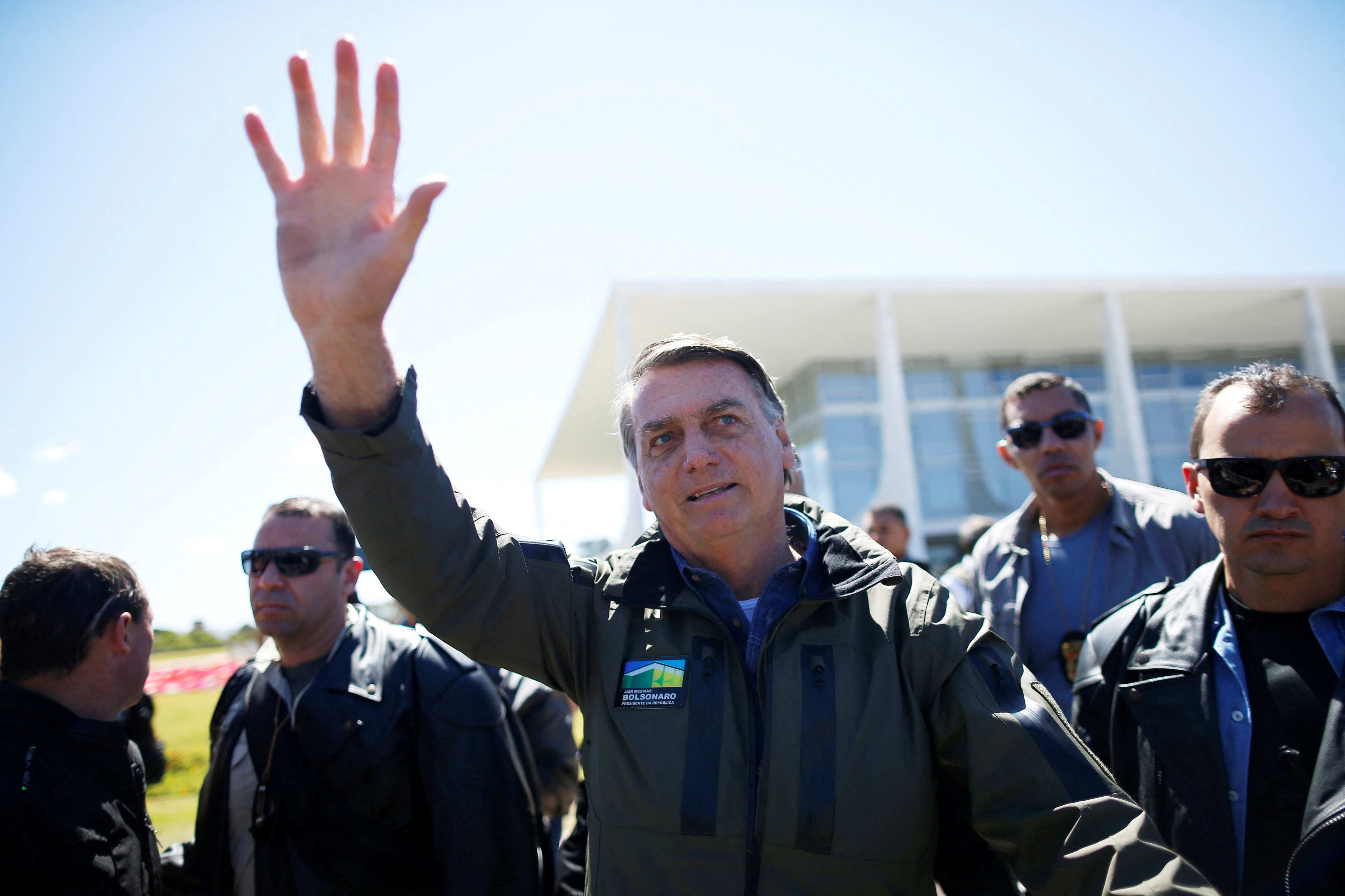 Brazil's President Bolsonaro leads a motorcade rally, in Brasilia