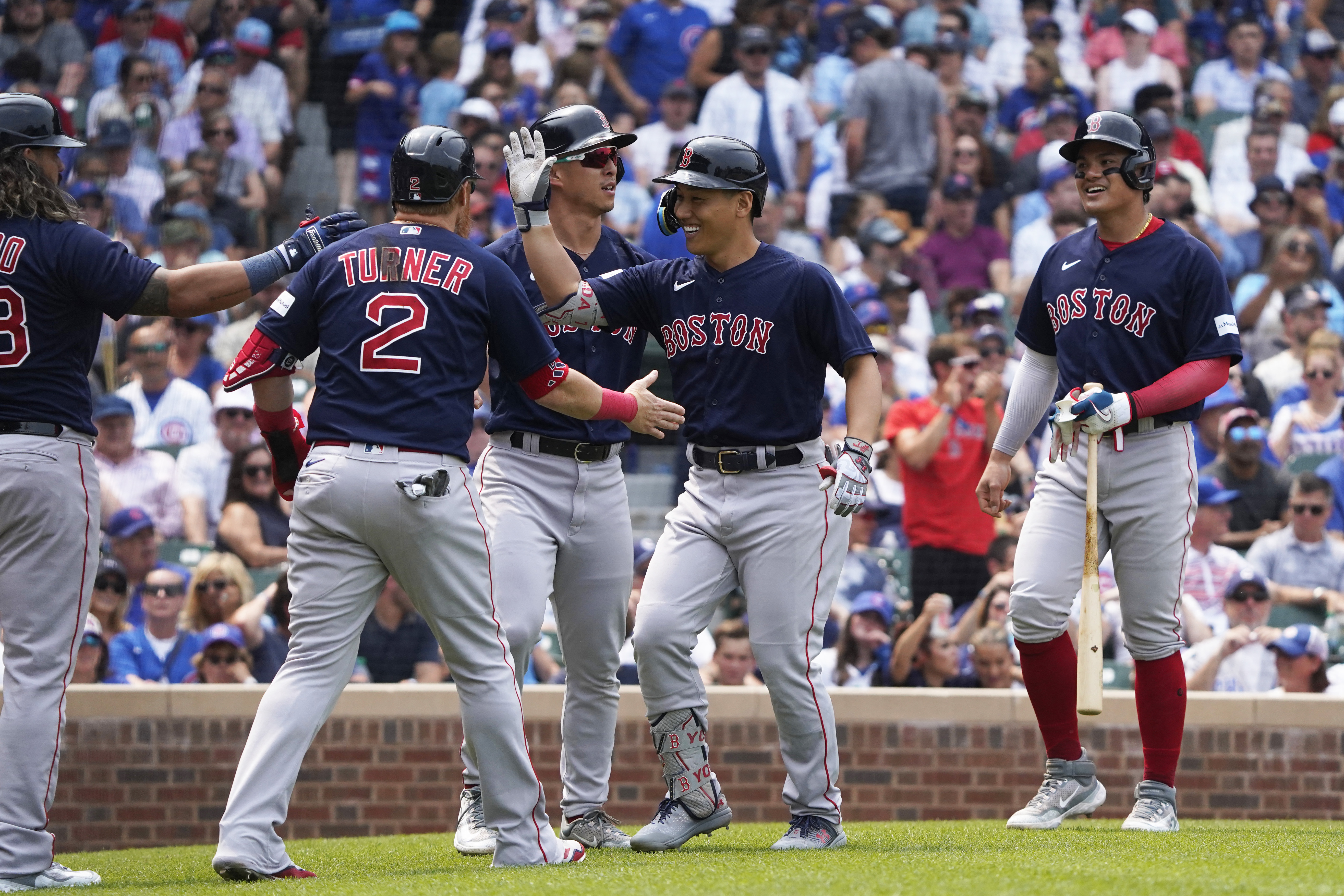 Yoshida hits a grand slam and drives in 6 as the Red Sox rout the Cubs 11-5  behind Crawford